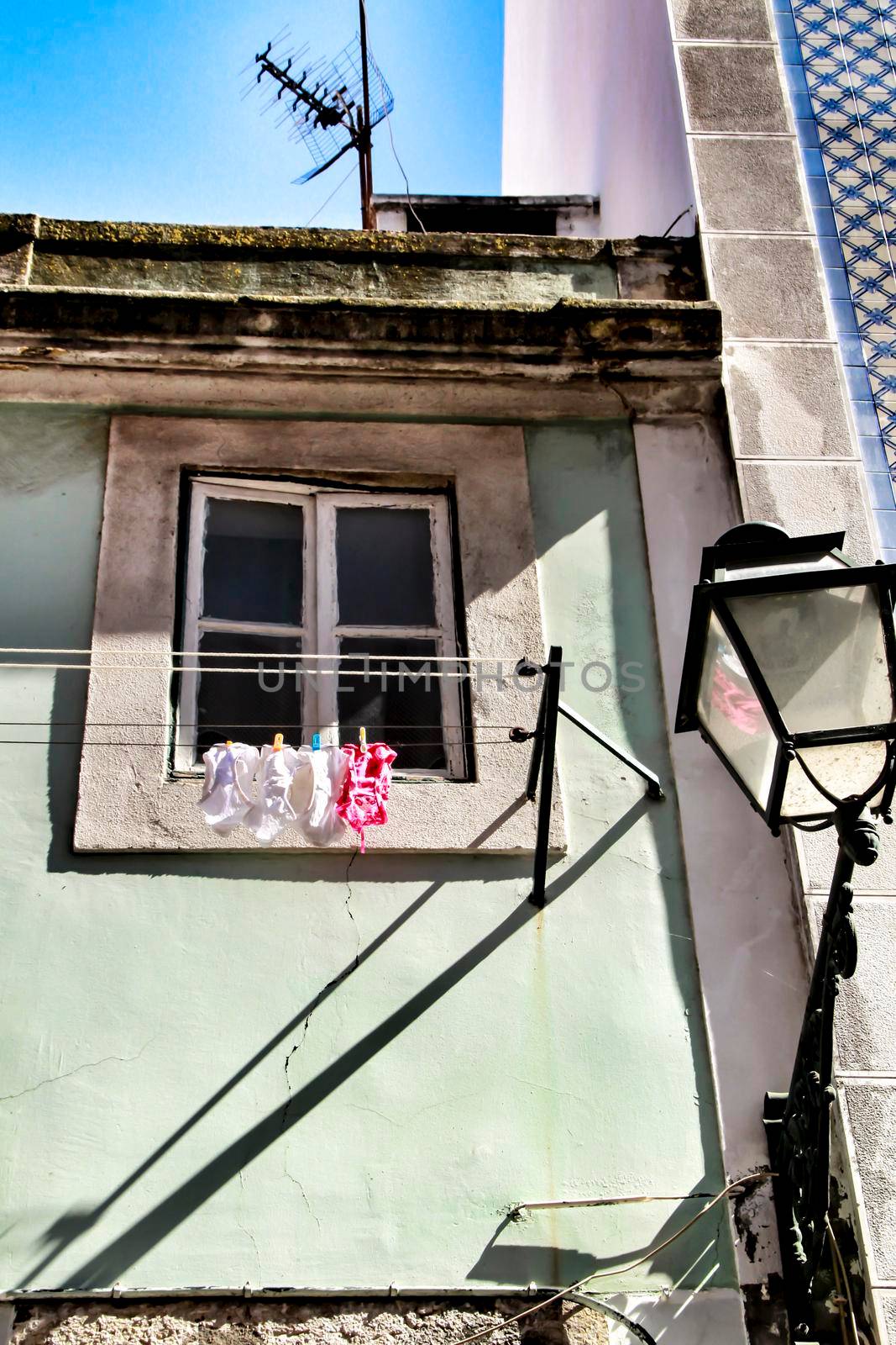 Old and typical facade in the street of Lisbon
