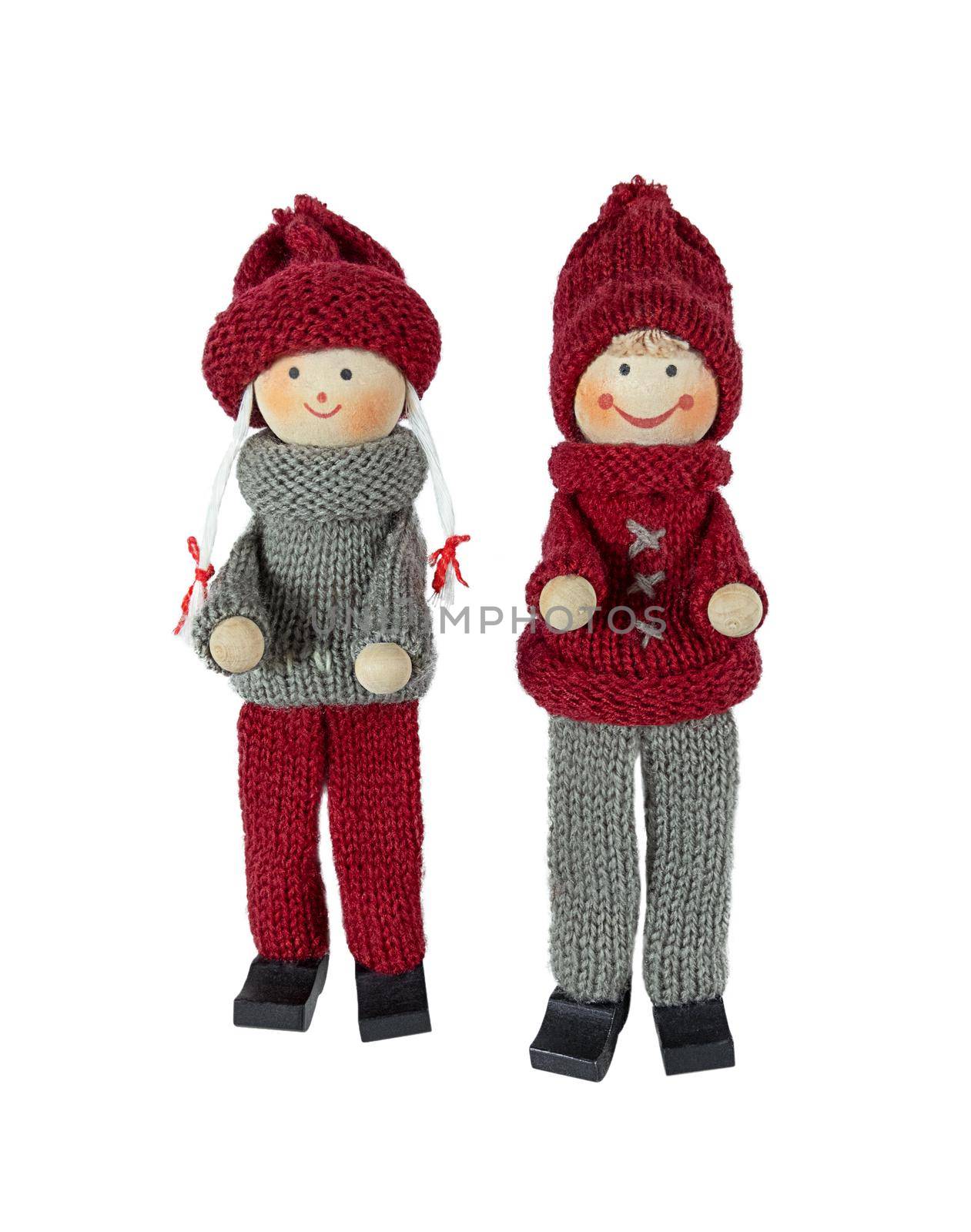 Knitted Christmas dolls of girl and boy isolated on a white background.