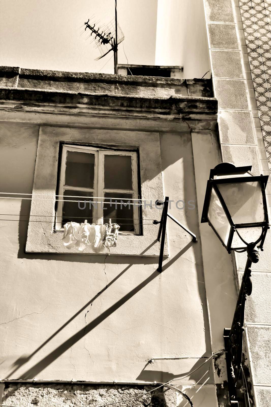 Old and typical facade in the street of Lisbon