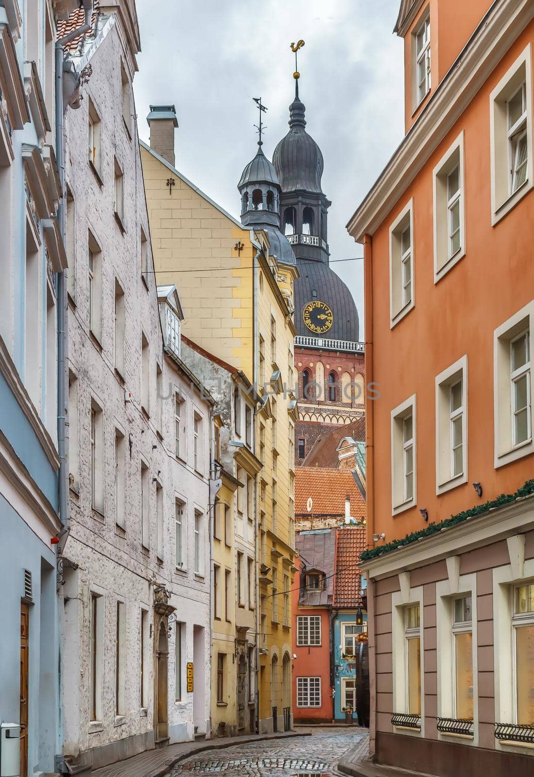 Street in Riga old town with Dome cathedral, Latvia