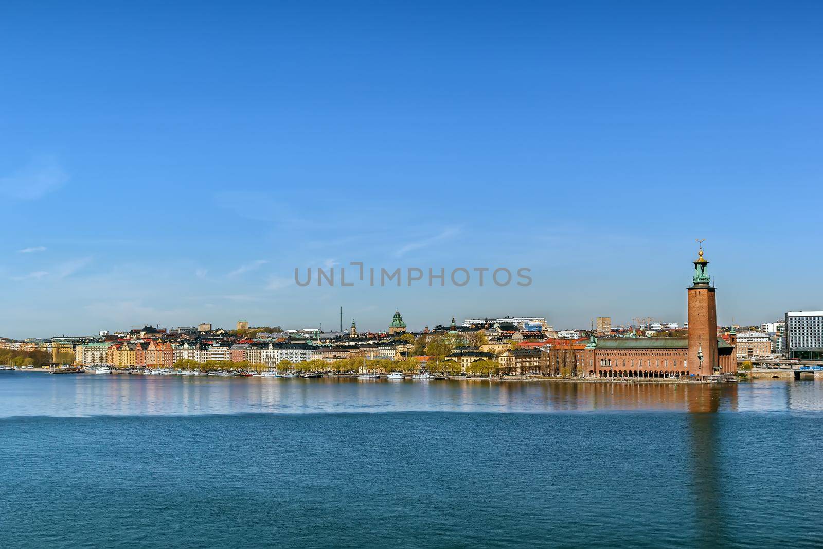 View of embankment wityh City Hall of Stockholm from the Sodermalm island, Sweden