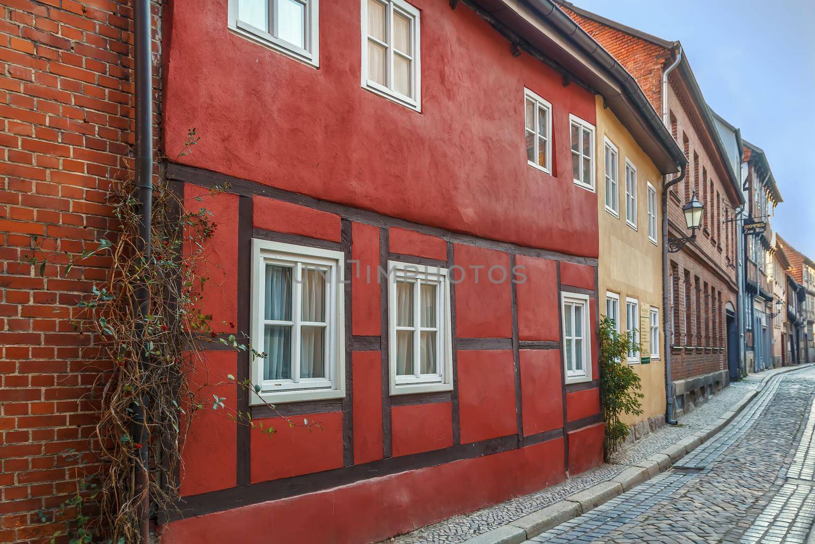 Sstreet with historical half-timbered houses in Quedlinburg, Germany