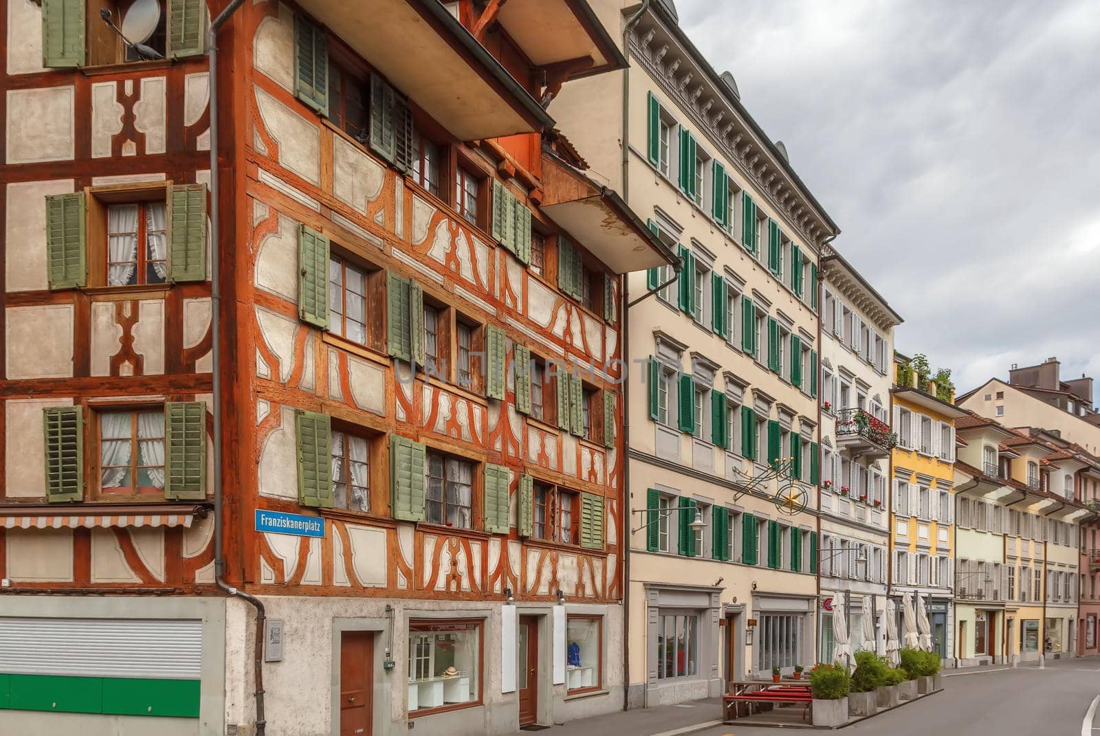 Street with historical houses in Lucerne city center, Switzerland