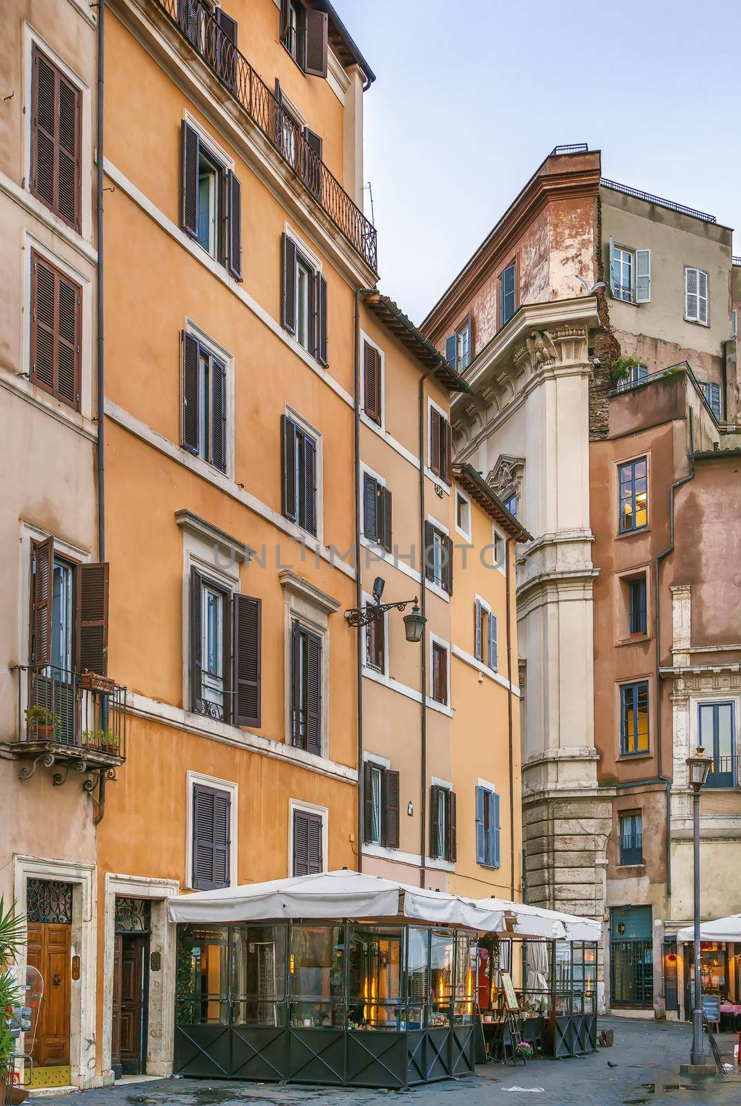 Street with historical houses in Rome old townd, Italy