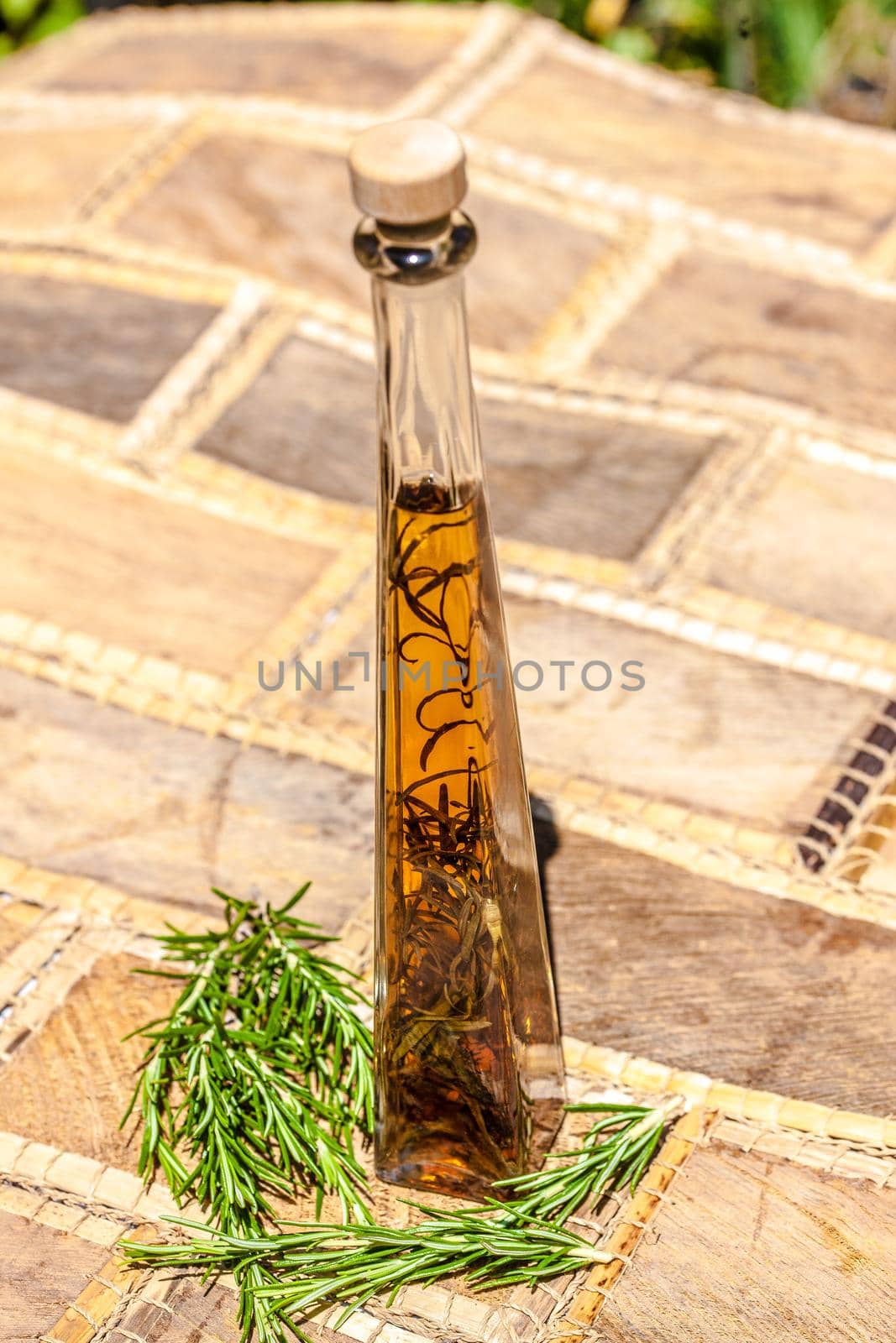 Oil and Herbs in a bottle  by Weltblick