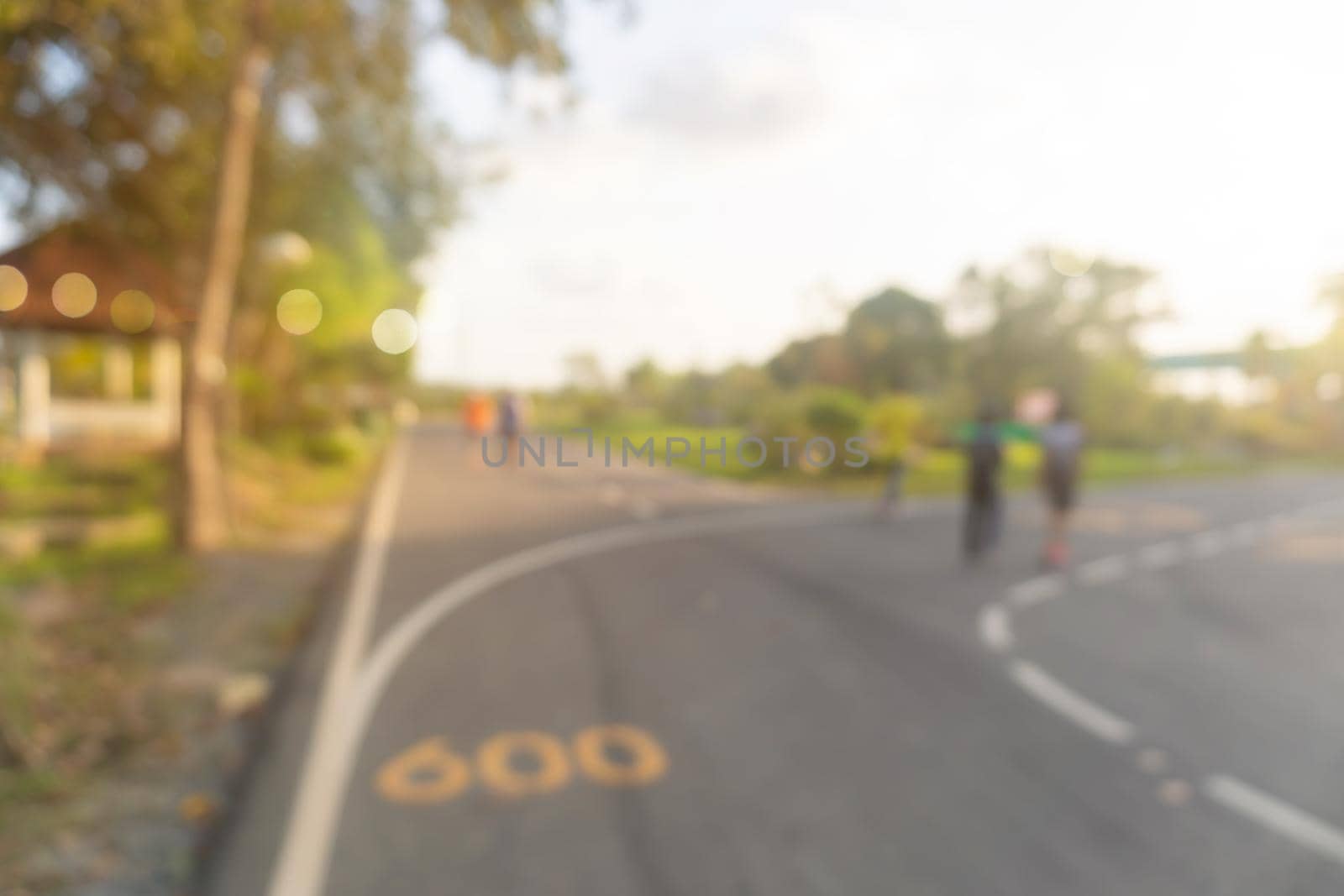 Blur public exercise park for people runnung, jogging and walking. Healthy living lifestyle background.