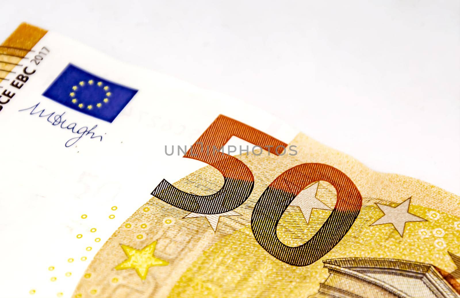 Detail of a 50 euro banknote isolated on a white background. by rarrarorro