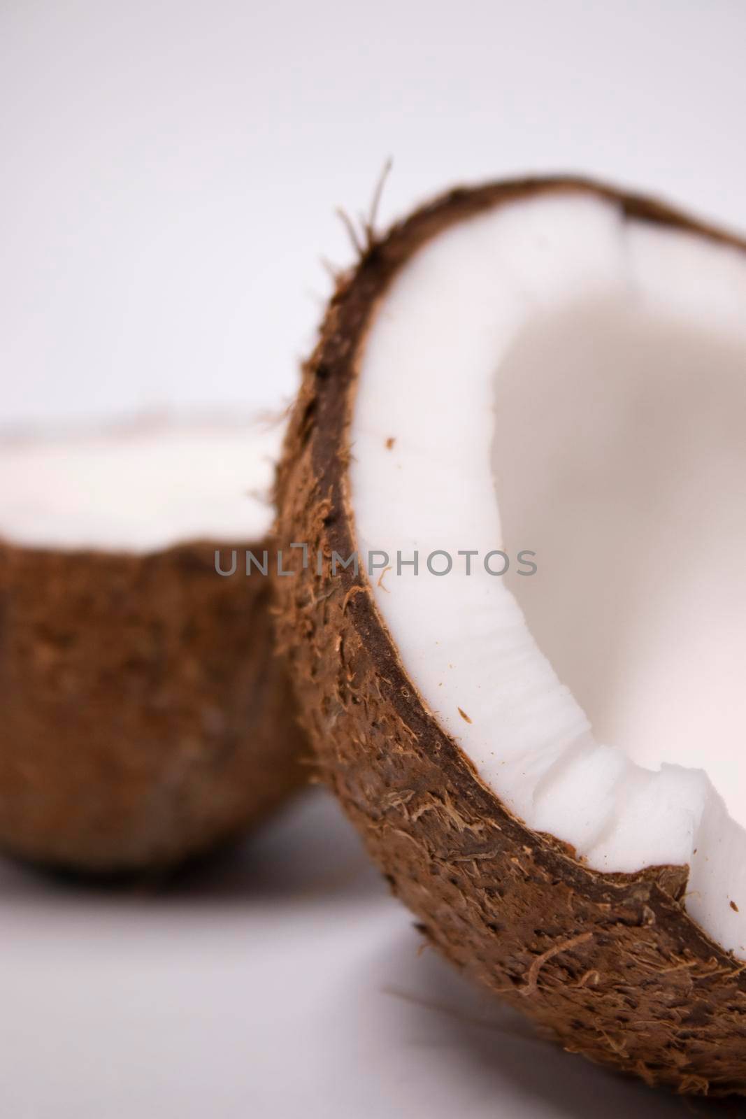 opened coconut isolated on white background. tropical fruit, nut.