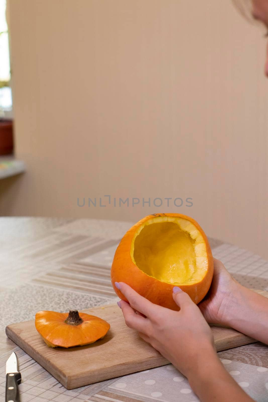 the process of making a Halloween pumpkin. cleansing of seeds. horror theme and Hallowe'en by oliavesna