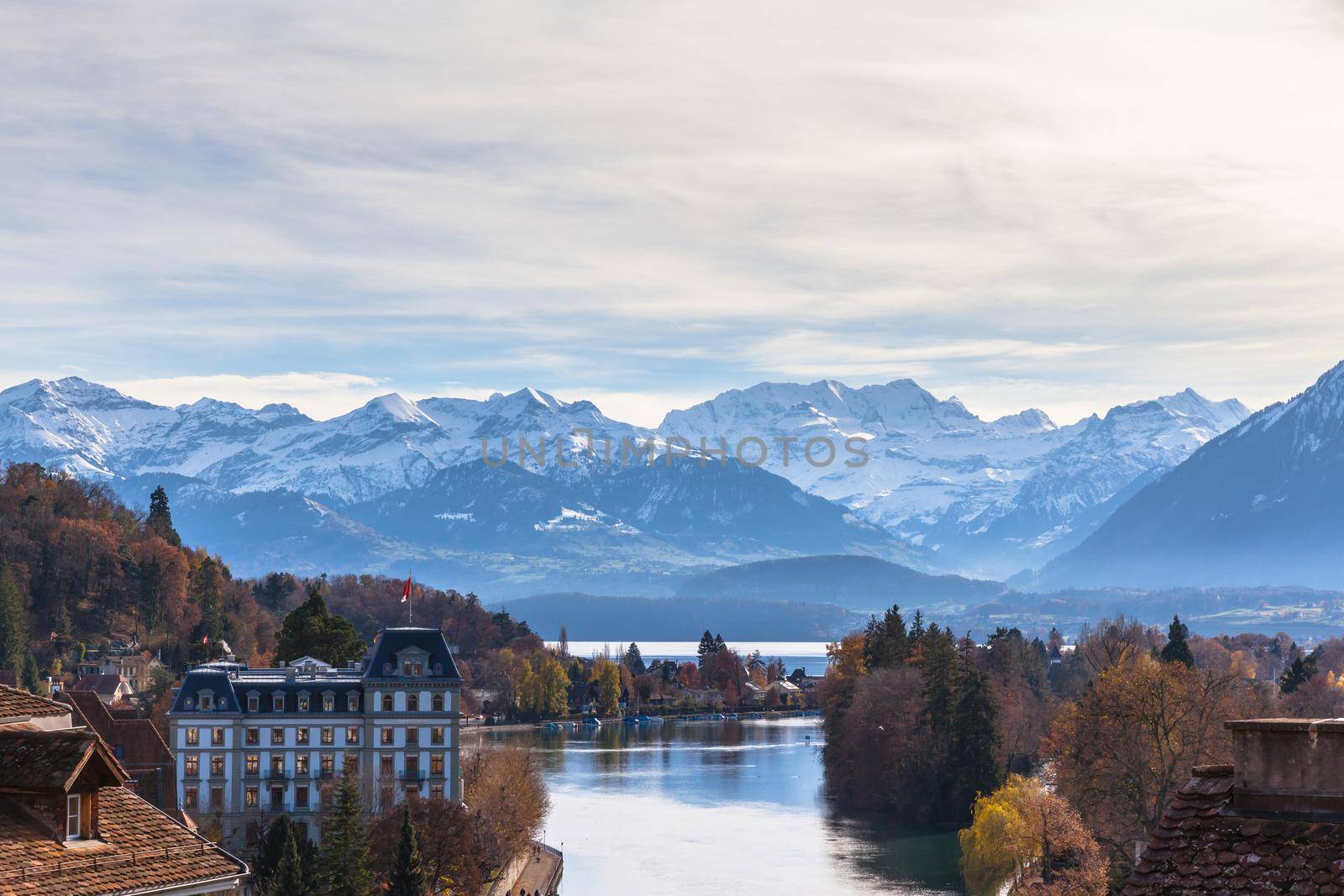 Stunning view of the Thun city and lake of Thun from the Thun castle with the snow covered peaks of Alps in background, Canton of Bern, Switzerland