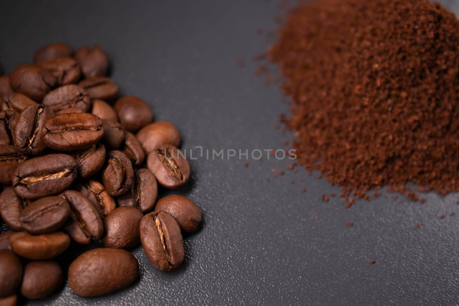 pile of ground or instant coffee and roasted coffee beans seeds. background.