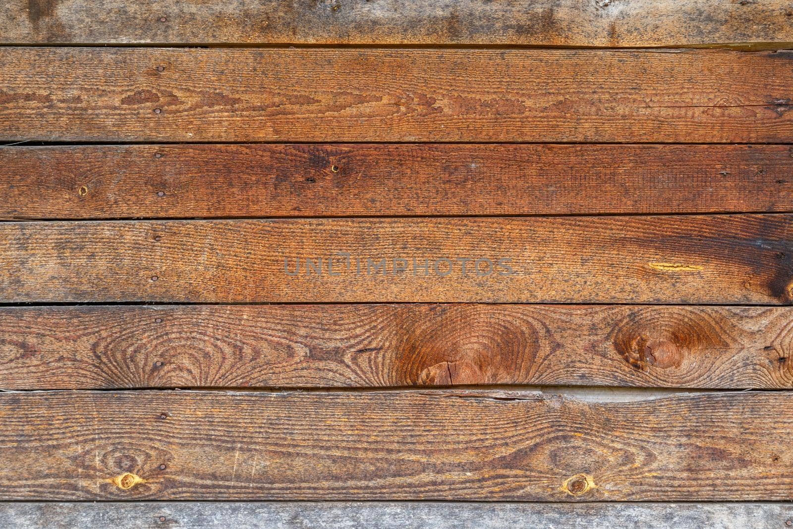 orange uncoated wooden planks wall suface texture and background.