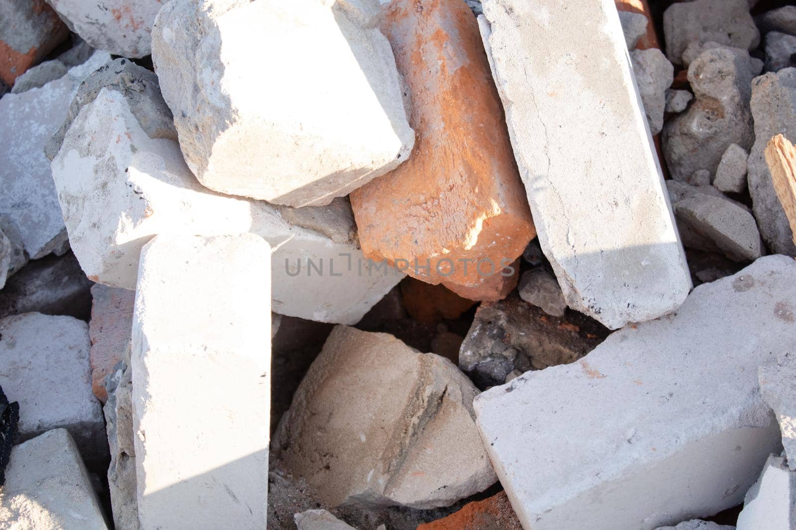 pile of old used bricks. background. construction of houses.