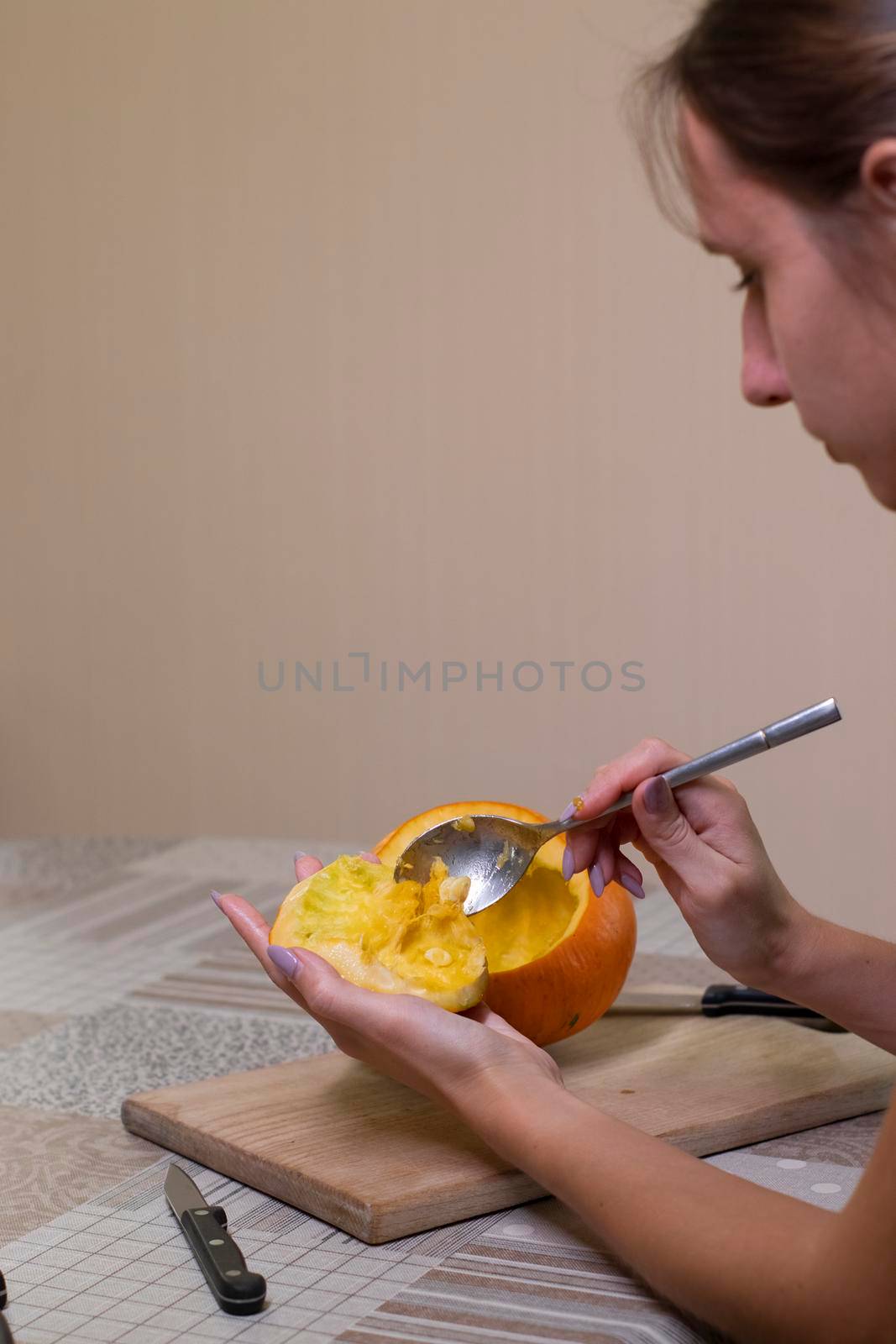 the process of making a Halloween pumpkin. cleansing of seeds. horror theme and Hallowe'en by oliavesna