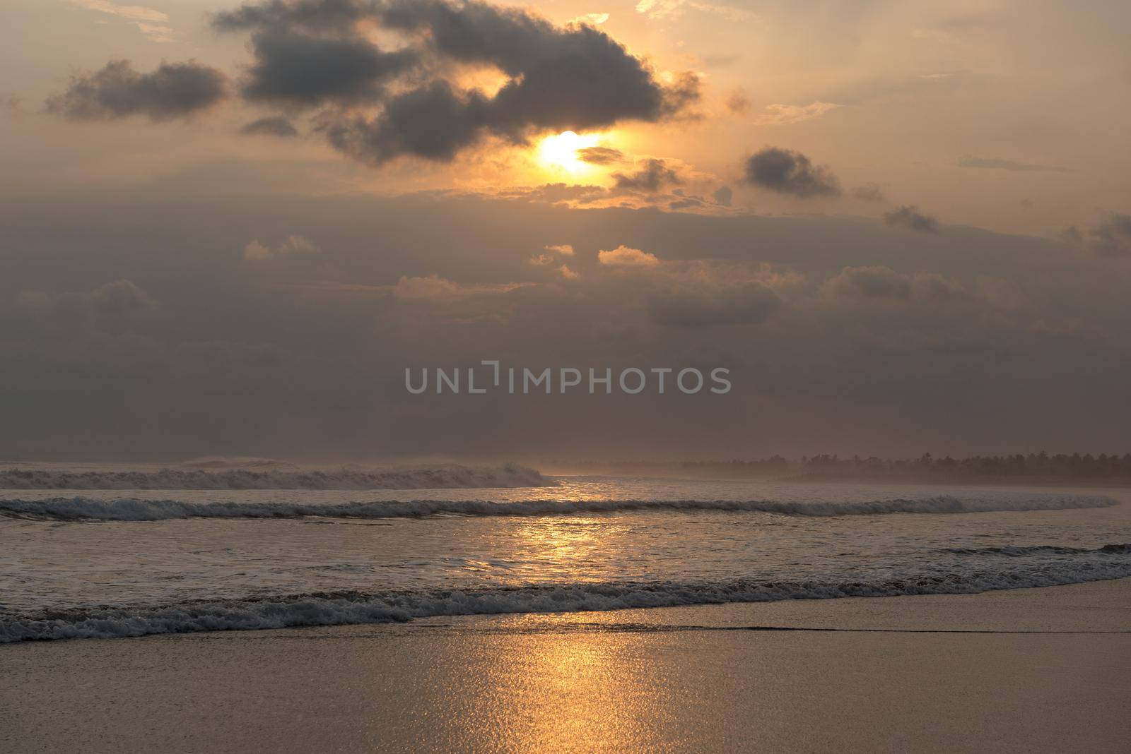 Sunset on the beaches of Pandagaran in Java, Indonesia.