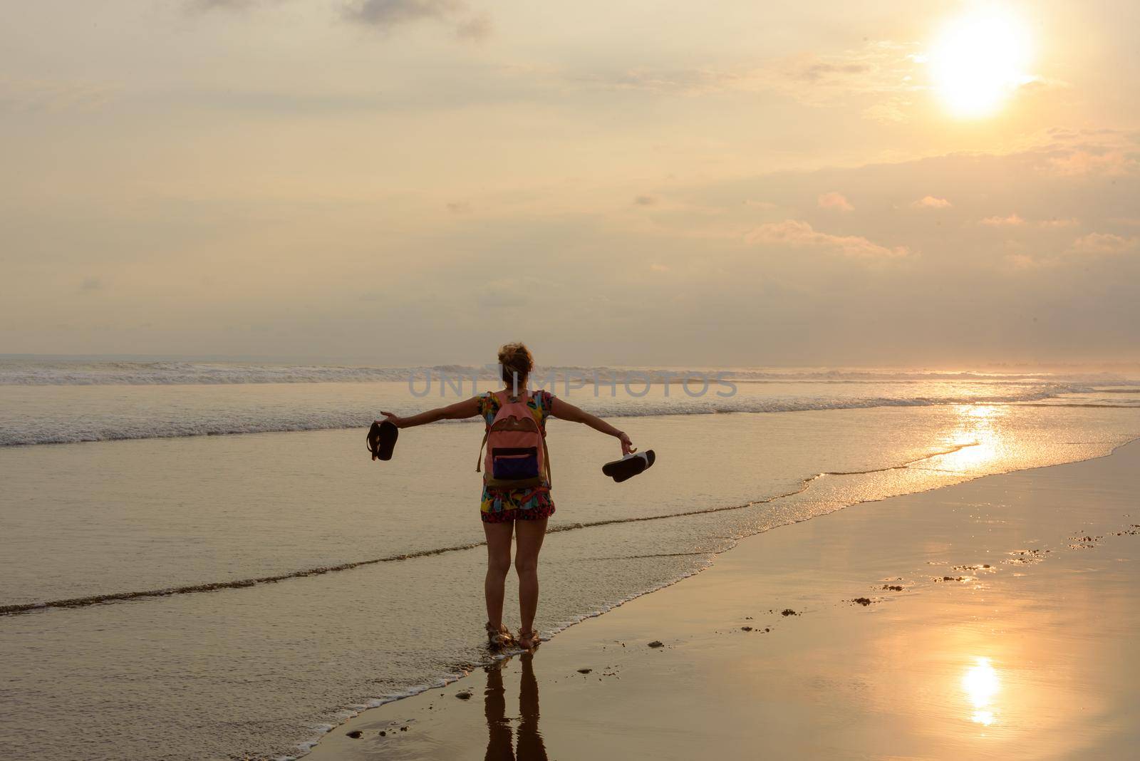 Pandangaran, Indonesia : 2018 April 18 : Young Tourist with a local gril on the beaches of Pandagaran in Java, Indonesia.