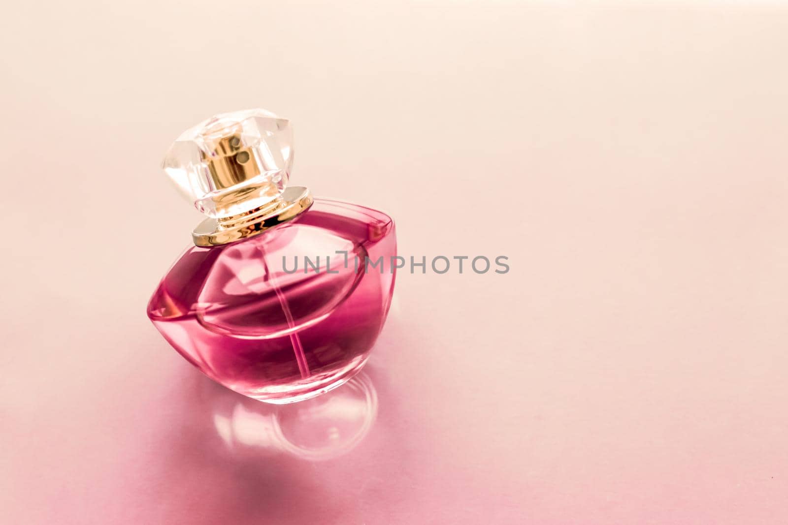 Pink perfume bottle on glossy background, sweet floral scent, glamour fragrance and eau de parfum as holiday gift and luxury beauty cosmetics brand design by Anneleven