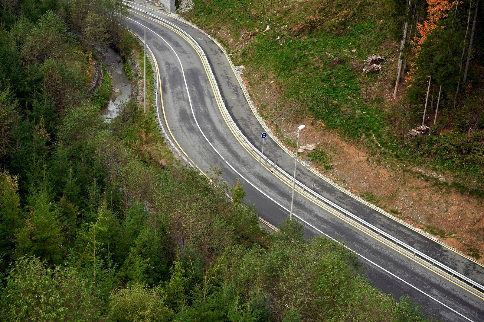Mountain road Aerial view of road through forest Nobody
