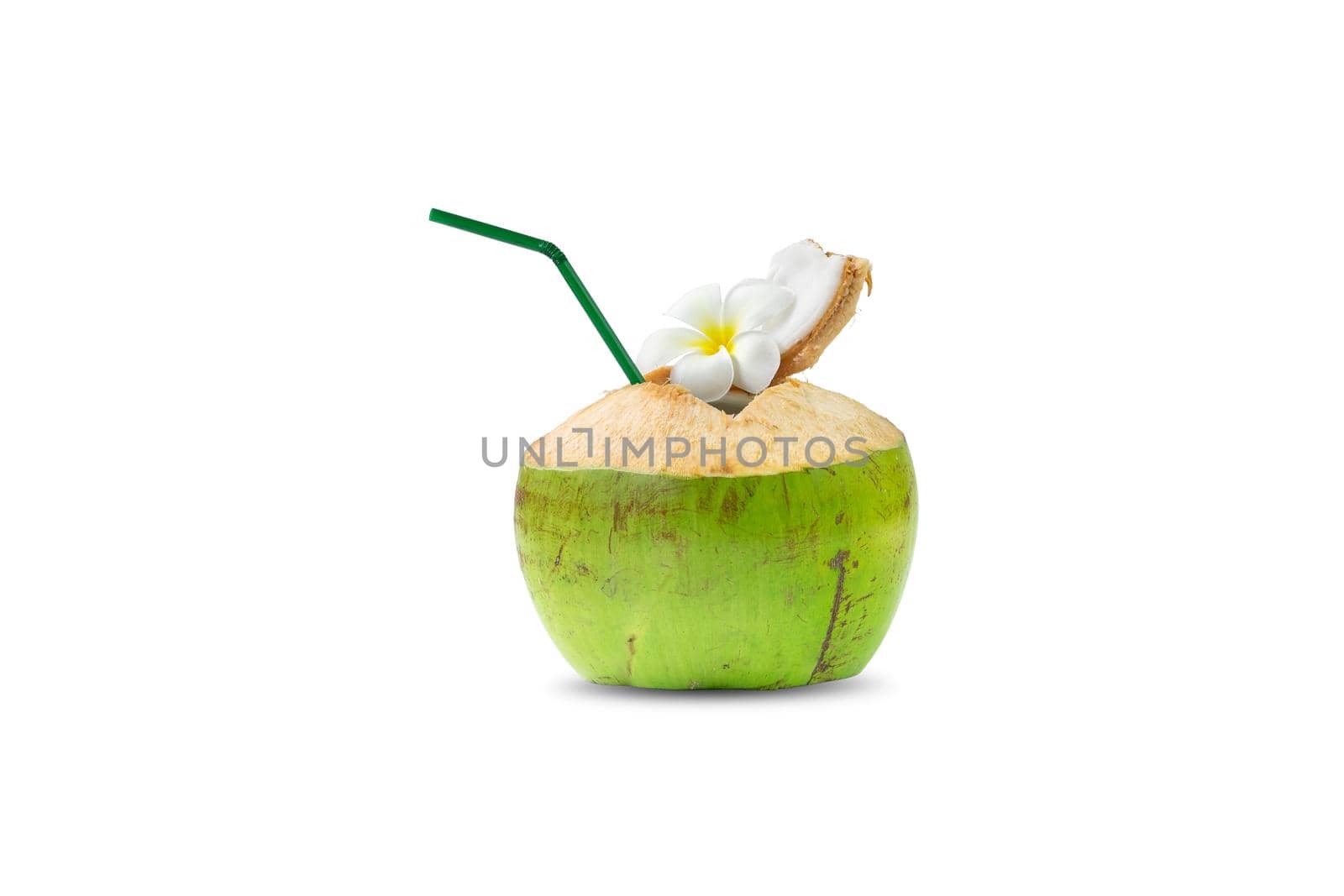 Fragrant coconut with holes inserted into a tube for drinking water inside of the coconut, on white background.