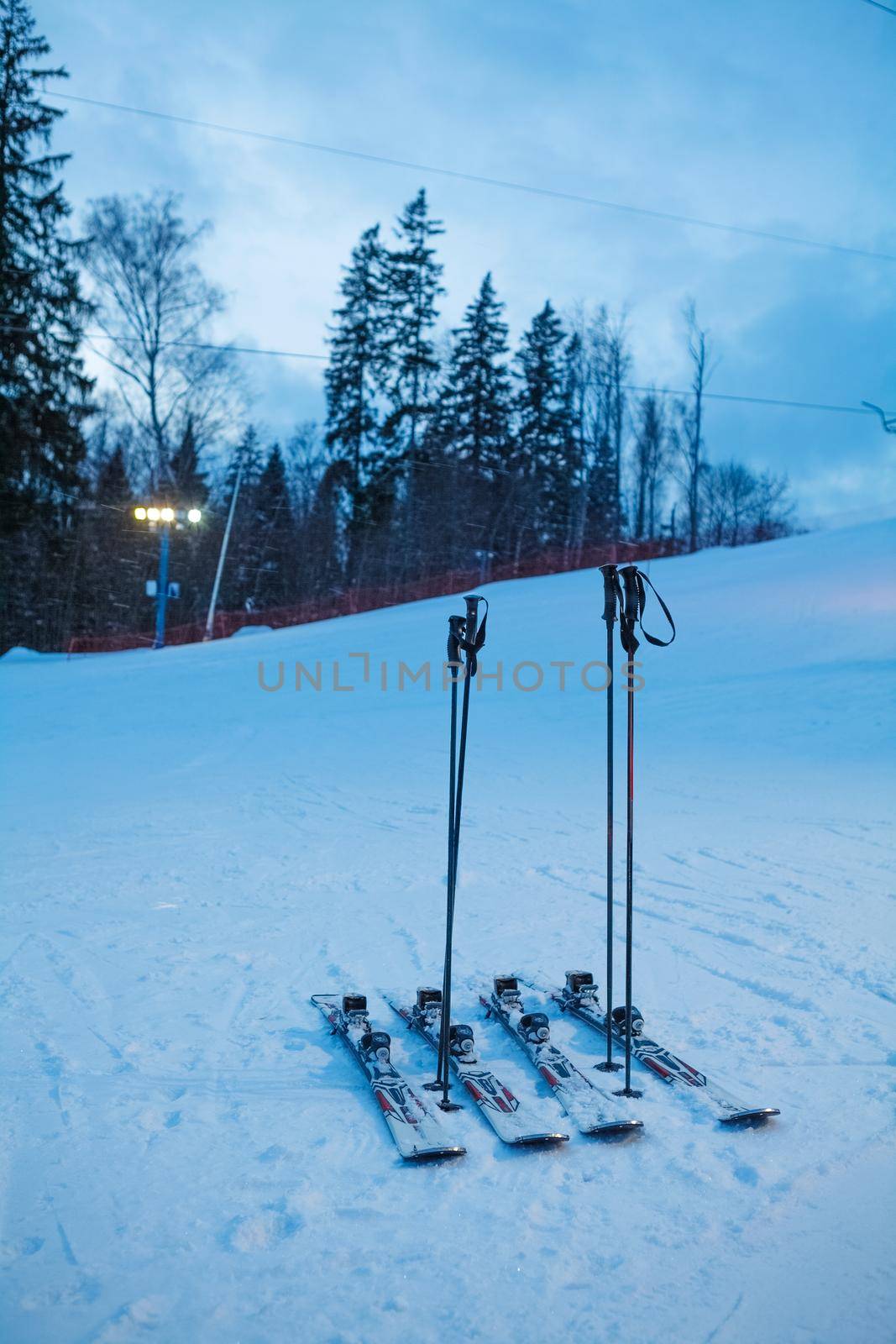 Skis on ski slope by dmitrysosenushkin