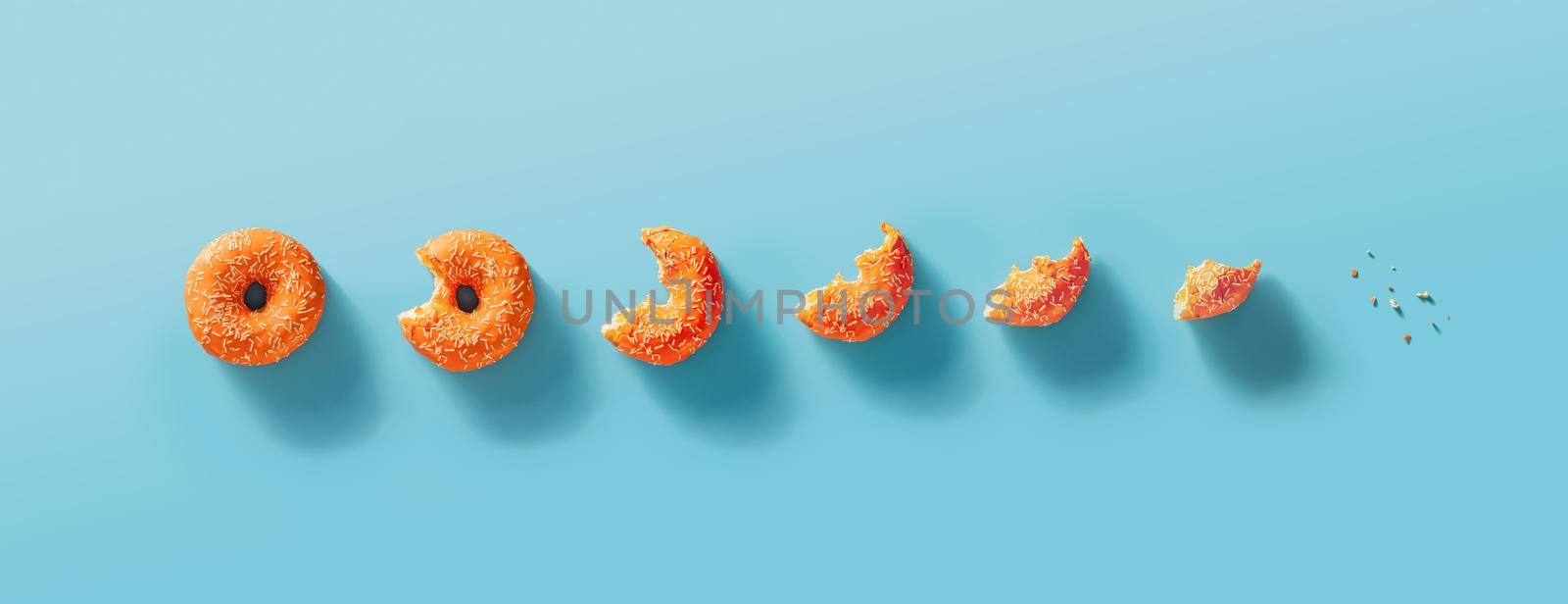 Seven stages of donut biting or eating down to crumb. Eaten donut with orange glaze and white sprinkles on blue background. Top view or flat lay. Horizontal banner