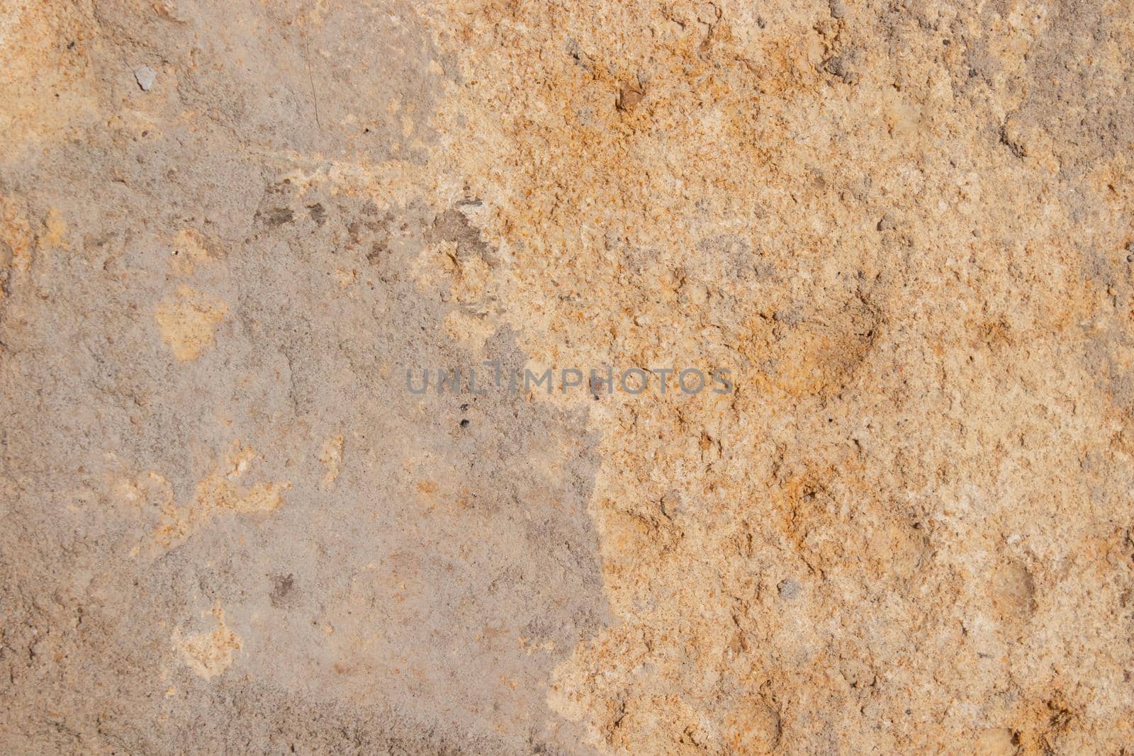 texture of stone concrete wall. cracked sand brick. pastel background solid.