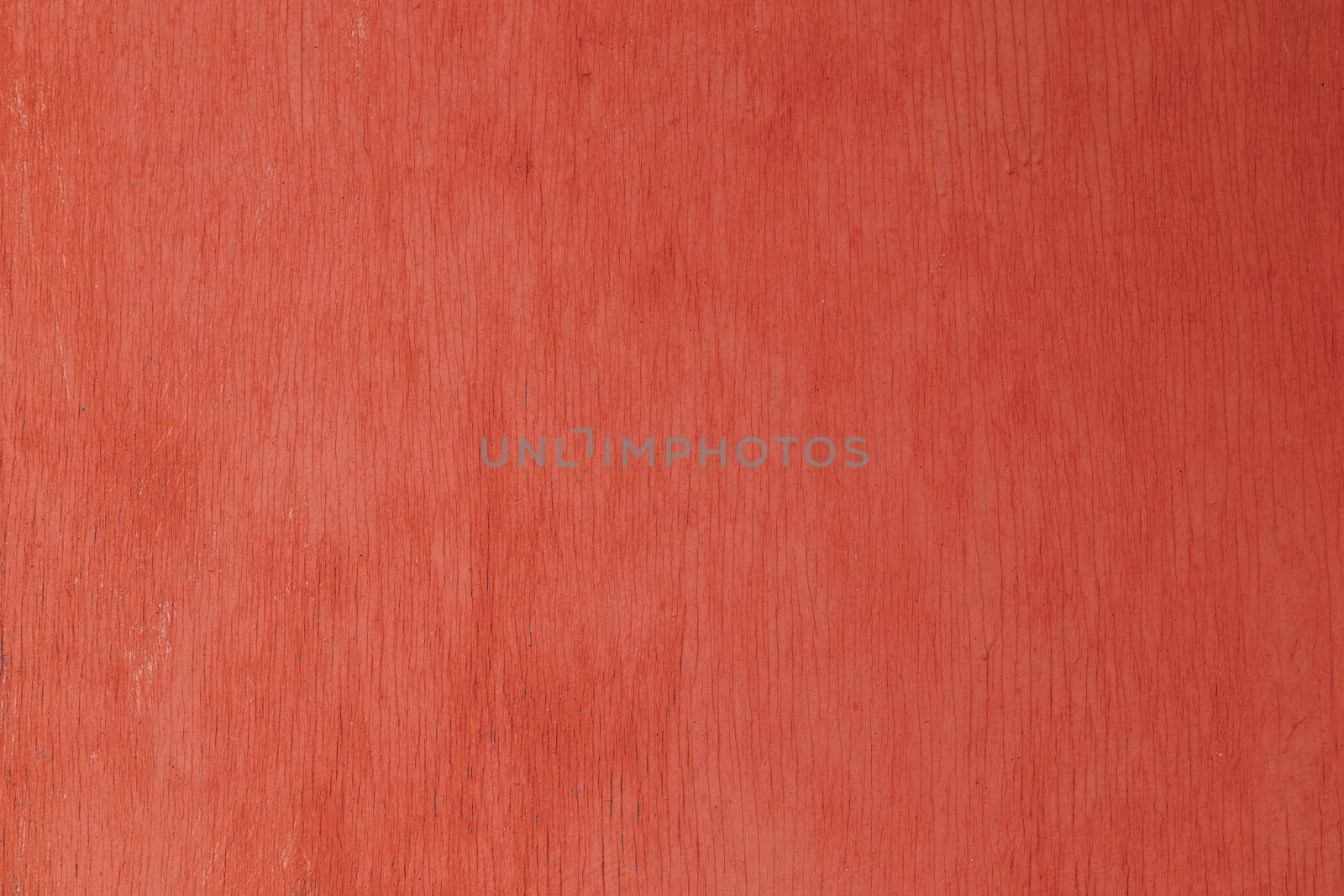 old red painted plywood flat surface texture and background with even vertical cracks