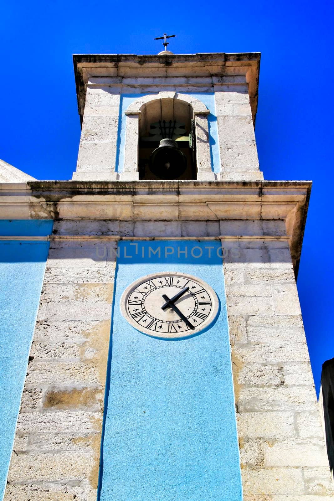 Beautiful facade of Nossa Senhora do Bom Sucesso church in Cacilhas, Lisbon, in a sunny day of Spring