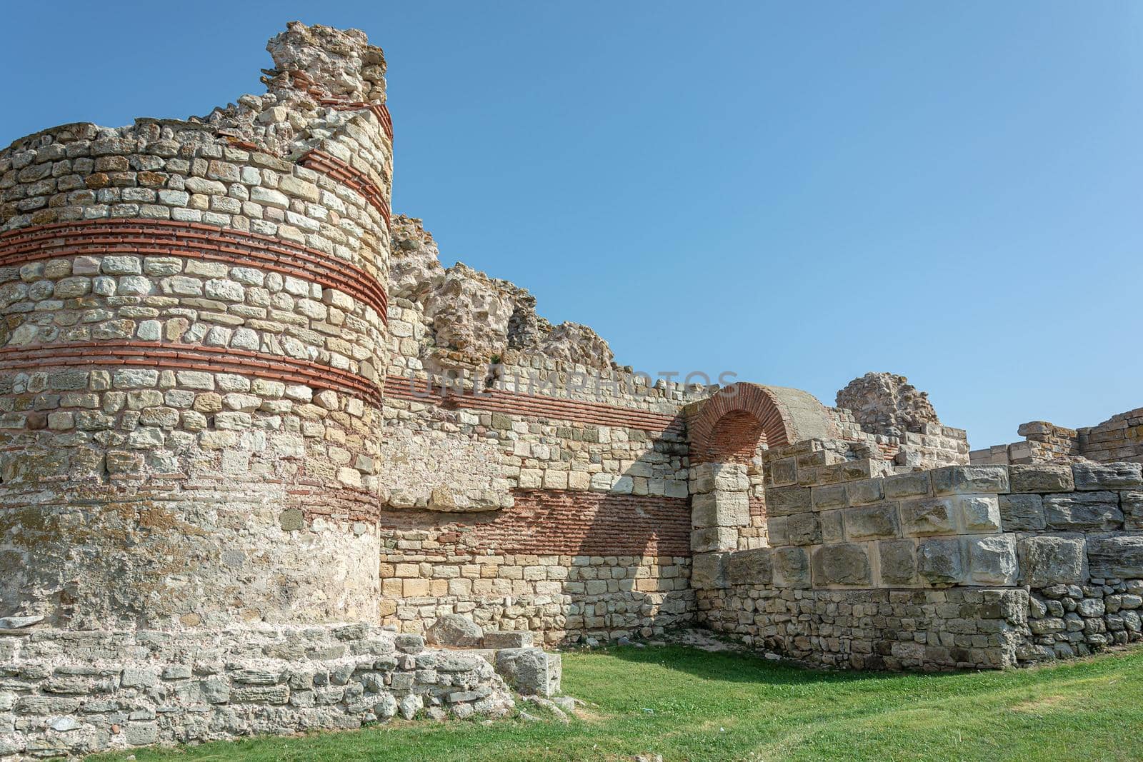 Destroyed fortress wall of the historical part of the old town of Nessebar (Bulgaria). Stock Photo
