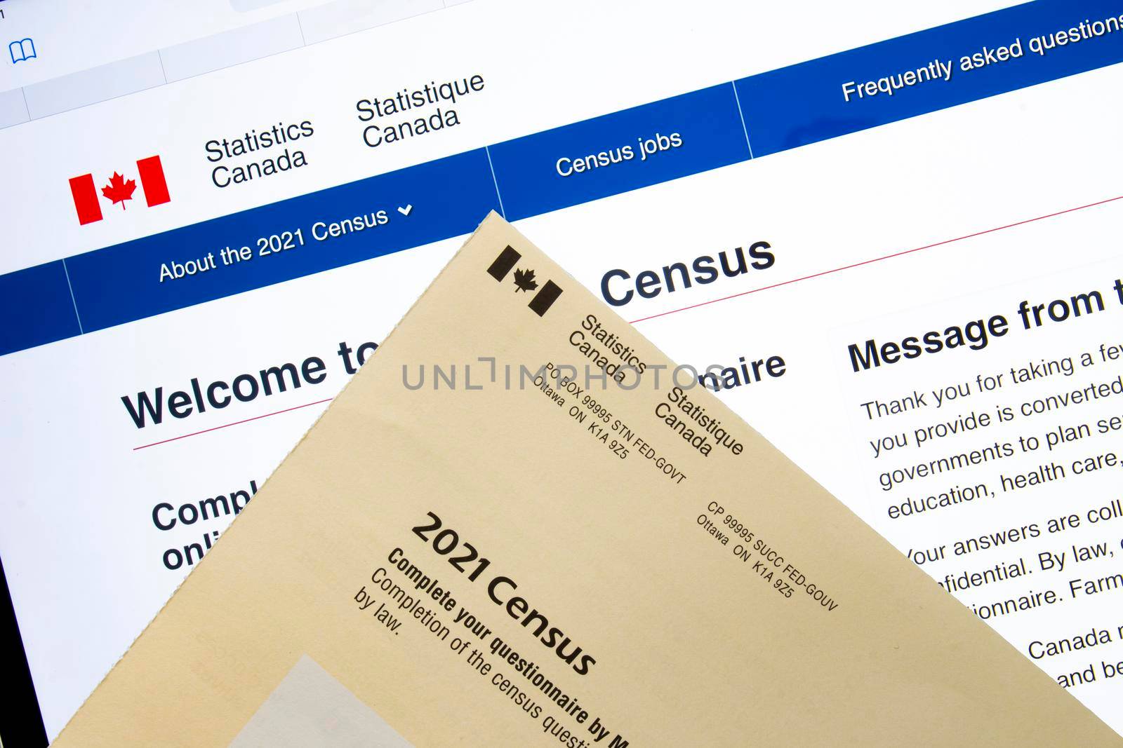 Calgary, Alberta, Canada. May 11, 2021. An online census questionnaire and paper mail.