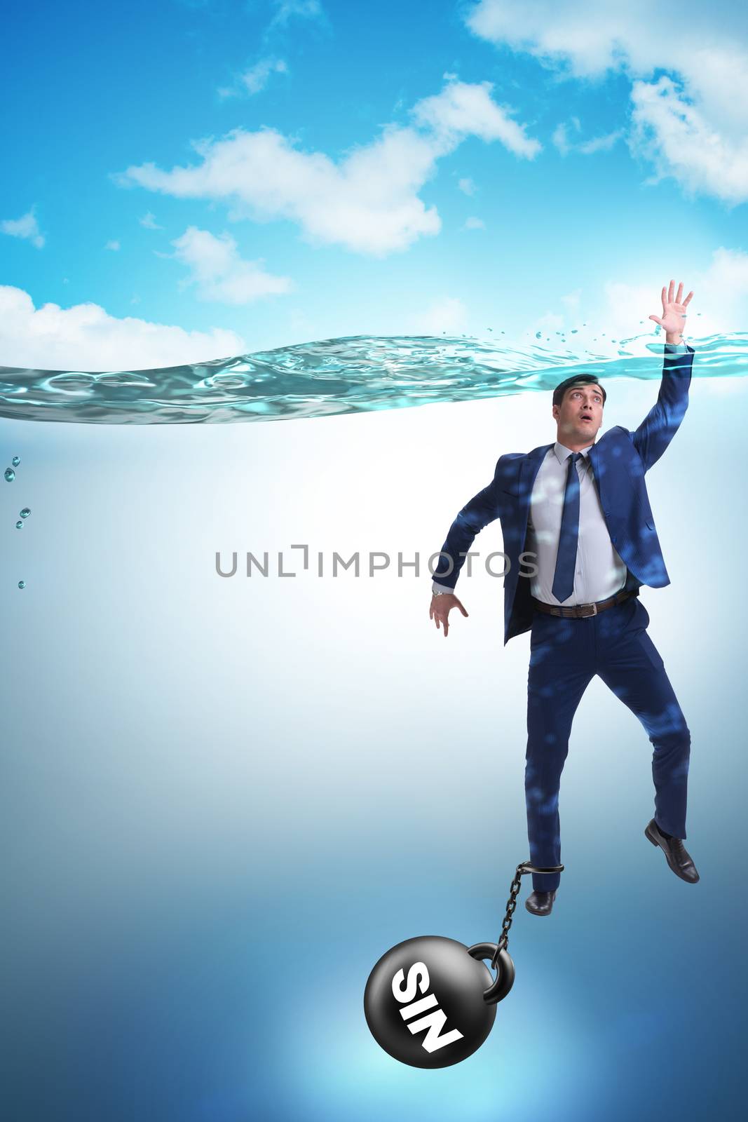 Businessman drowning under the burden of sin and guilt