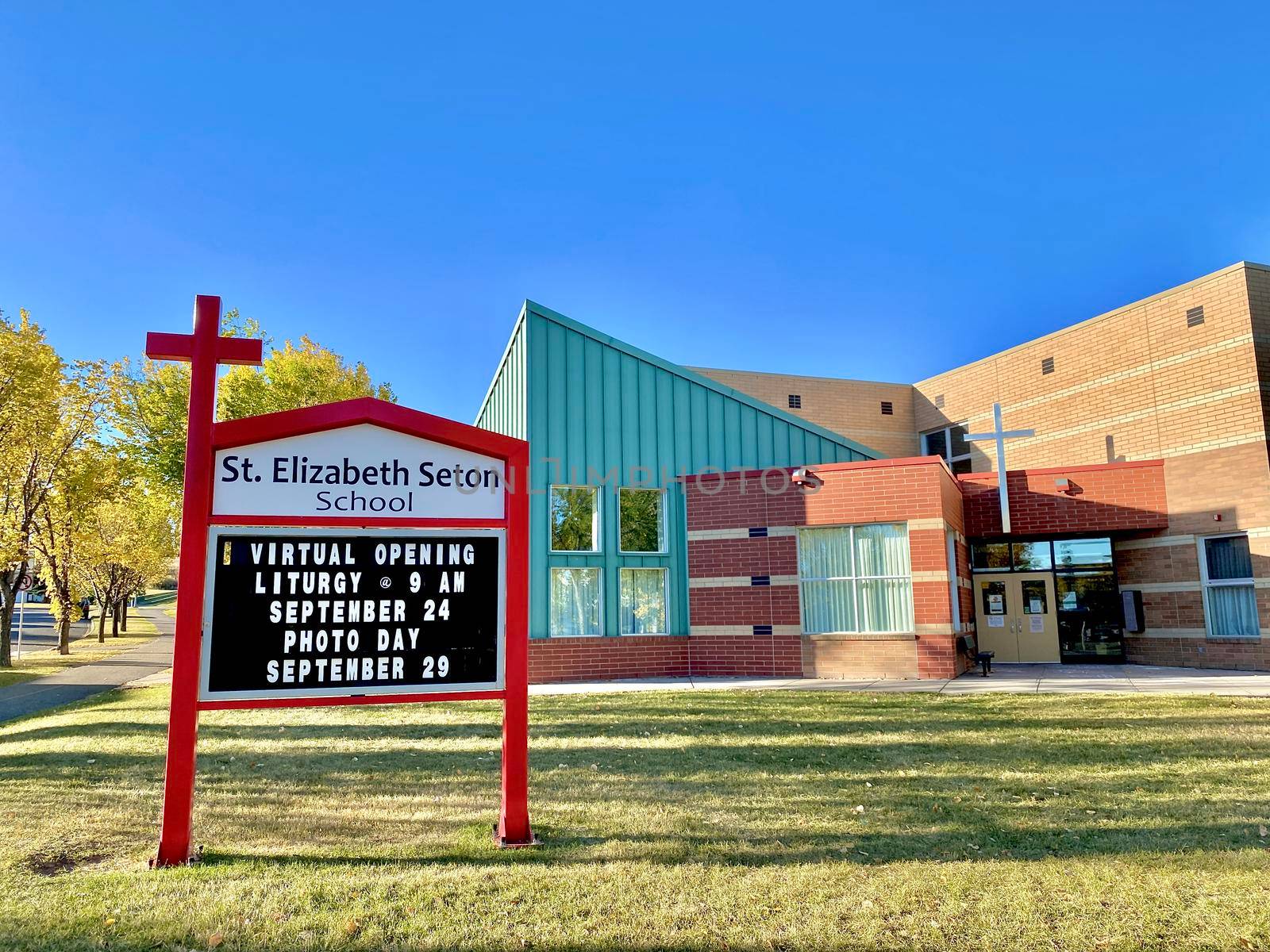Calgary, Alberta. Canada. Sep 27, 2020. Front view of a St. Elizabeth Seton School. Students are back to school during pandemic covid 19, coronavirus. Illustrative by oasisamuel