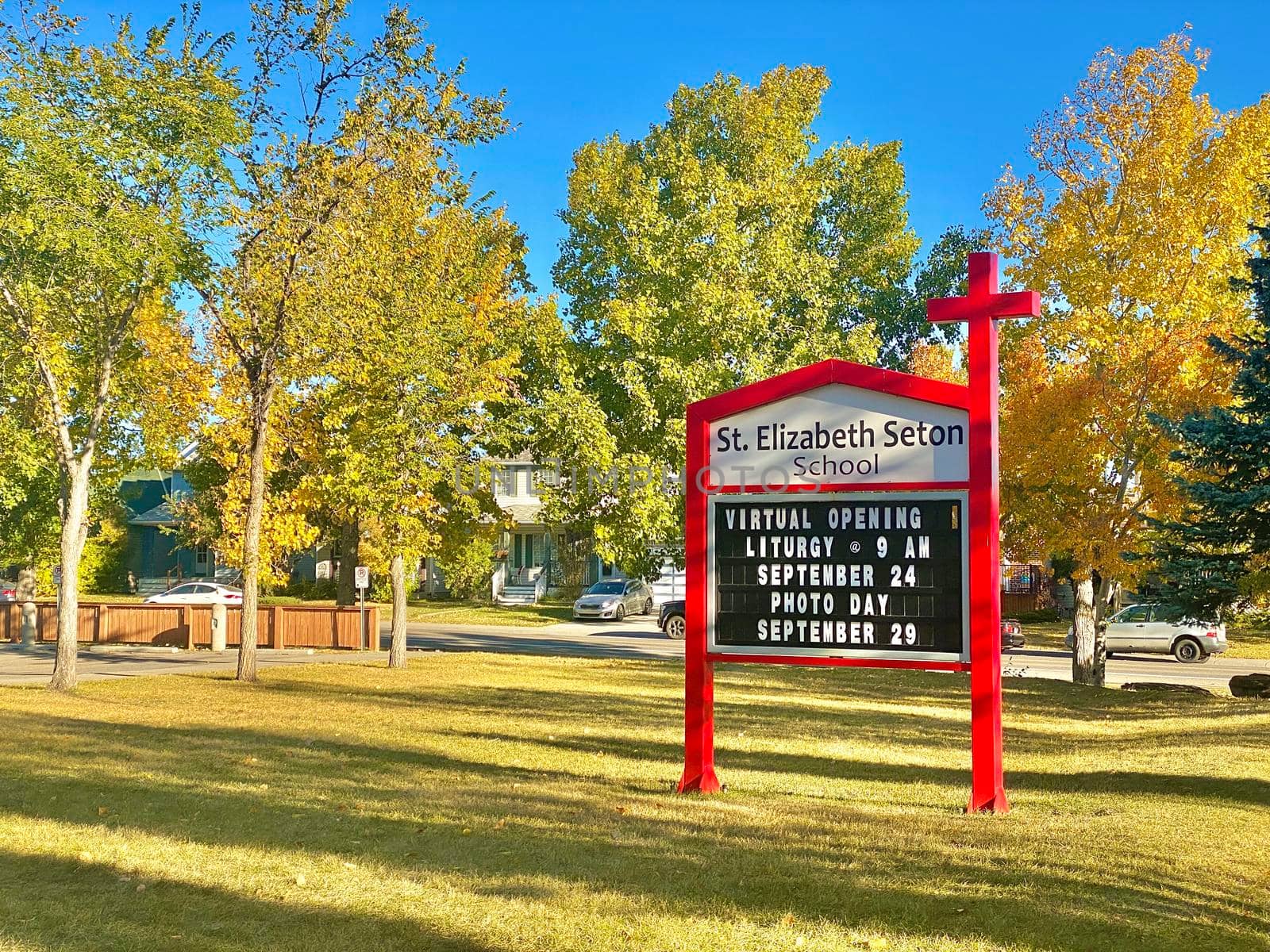 Calgary, Alberta. Canada. Sep 27, 2020. Catholic school sign: St. Elizabeth Seton School. Students during pandemic covid 19, coronavirus. Illustrative by oasisamuel