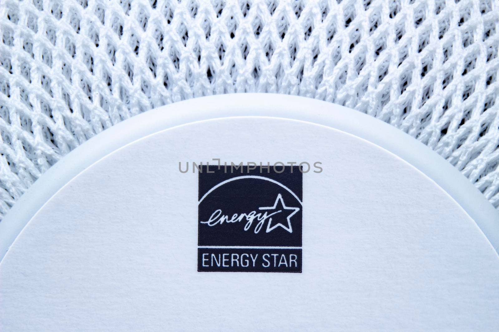 Calgary, Alberta, Canada. Dec 17, 2020. An Energy Star stamp on an Apple White Homepod Mini.