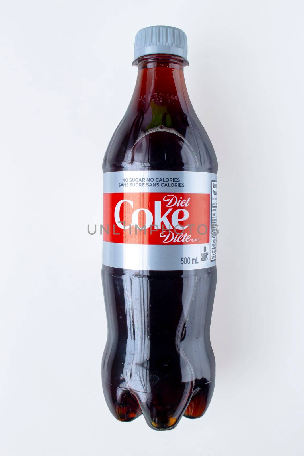 Calgary, Alberta, Canada. Oct 22. 2020. A Flat lay of a Diet Coke on white background. by oasisamuel