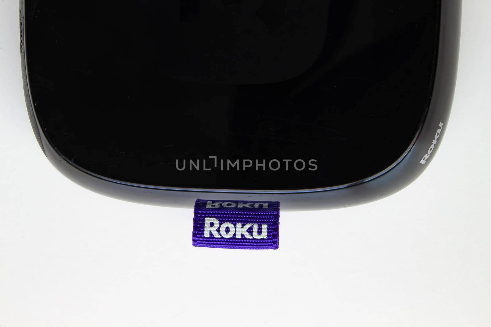 Calgary, Alberta, Canada. April 28, 2020. Top view of a Roku box on a white background by oasisamuel