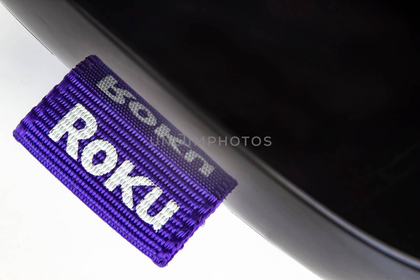 Calgary, Alberta, Canada. April 28, 2020. Macro Top view of a Roku box on a white background by oasisamuel