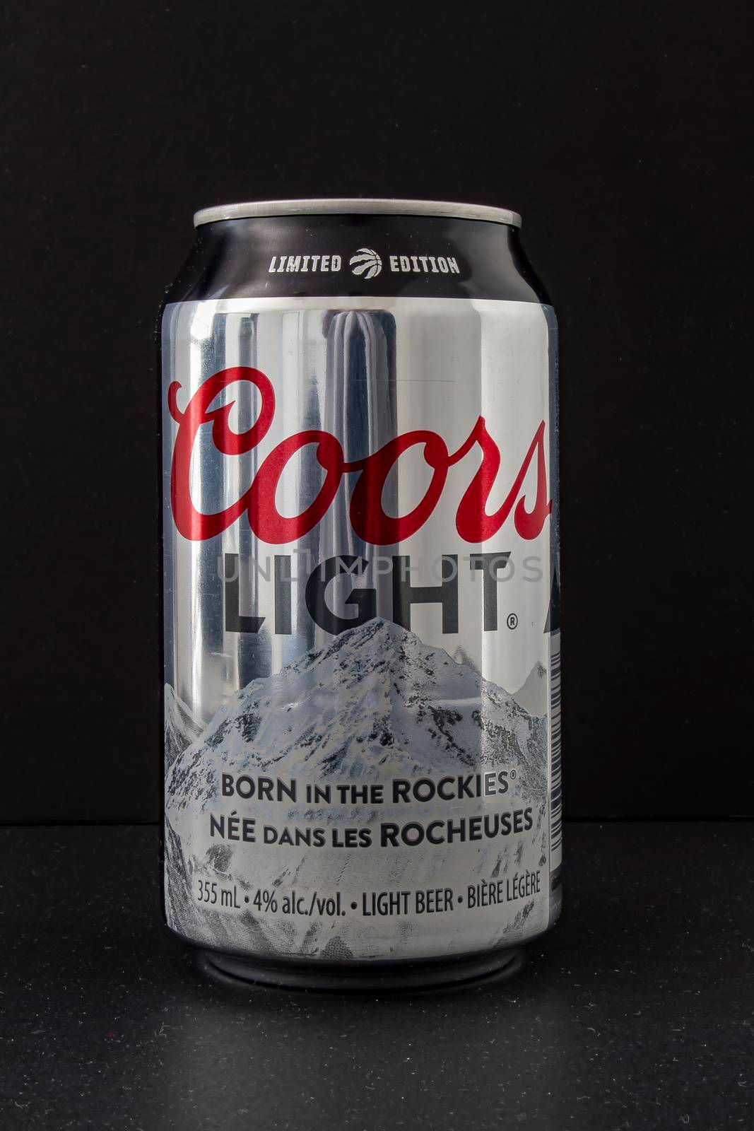 A beer can of Coors Light special edition silver can raptors, on a black background by oasisamuel