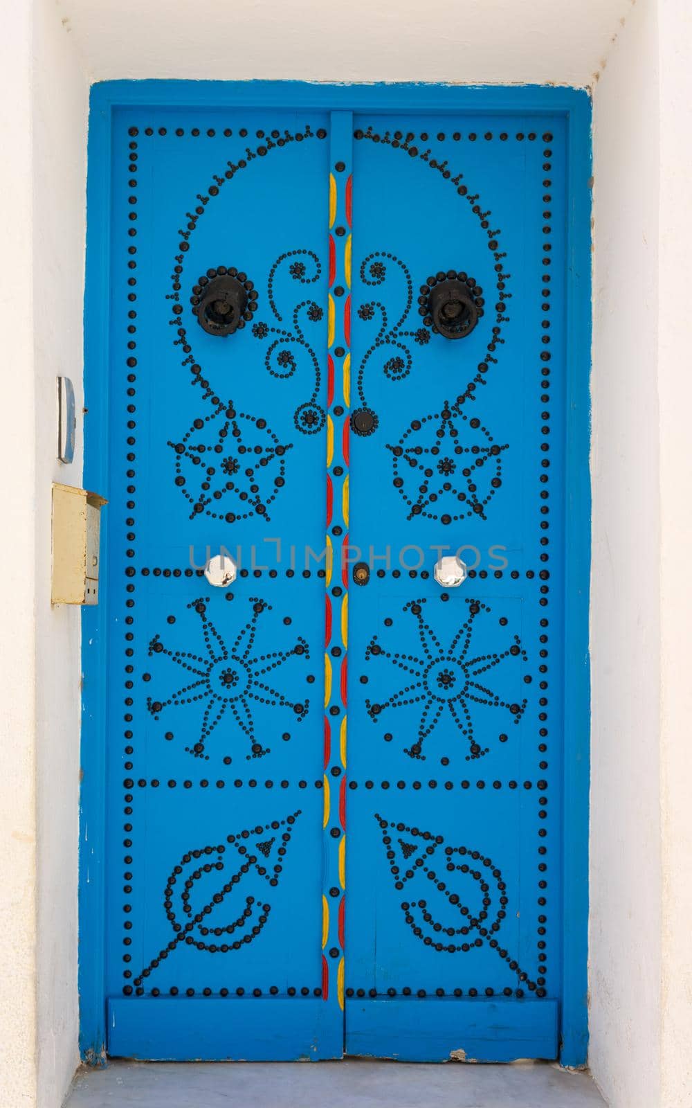 Blue door with ornament from Sidi Bou Said in Tunisia