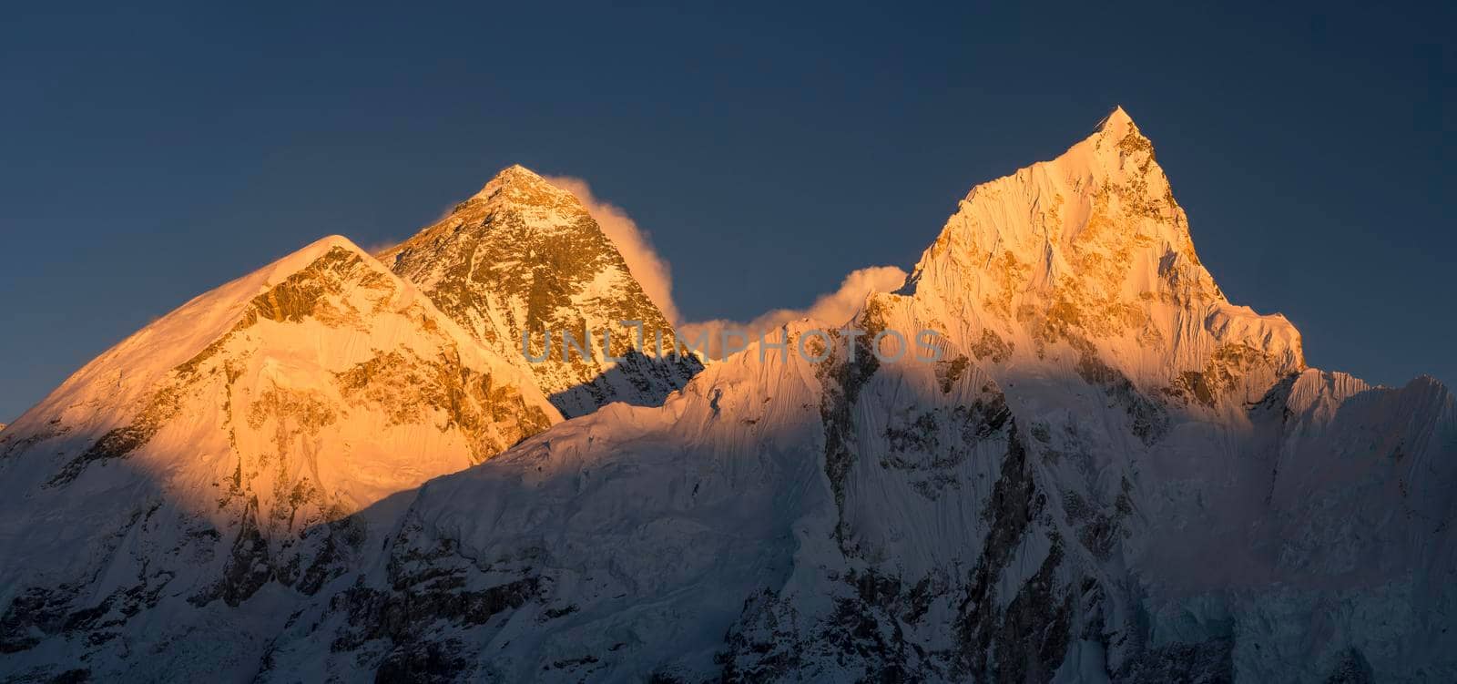 Everest and Nuptse summits at sunset or sunrise. Everest base camp trek, tourism in Nepal