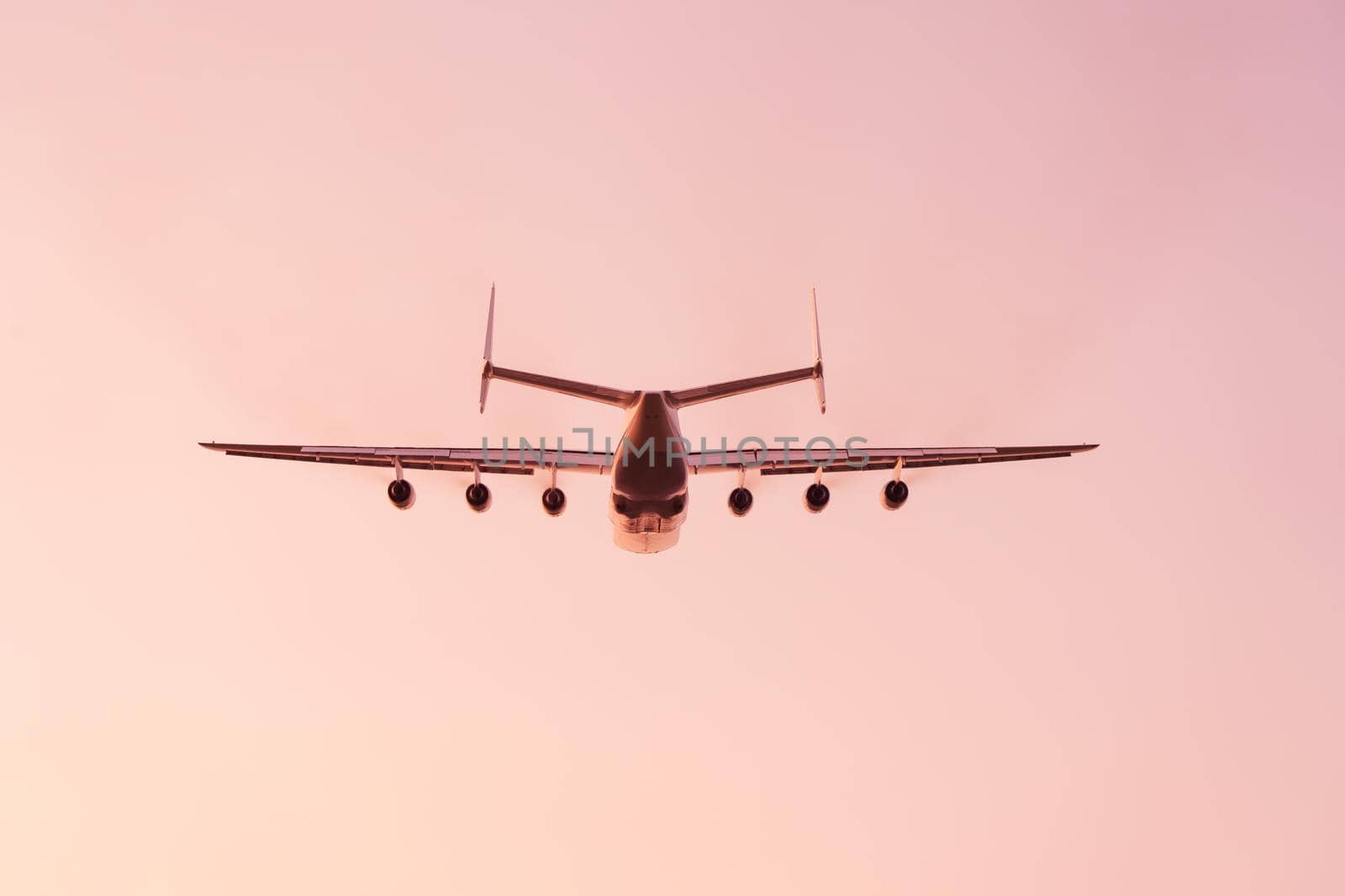 Antonov An-225 Mriya aircraft after take off from the Gostomel airport at sunset in Kyiv, Ukraine. This giant cargo plane is the heaviest aircraft ever built. Summer 2018