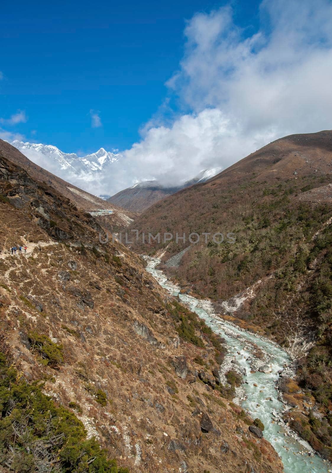 Lhotse summit, trail and river in the Himalayas. Everest base camp trek in Nepal
