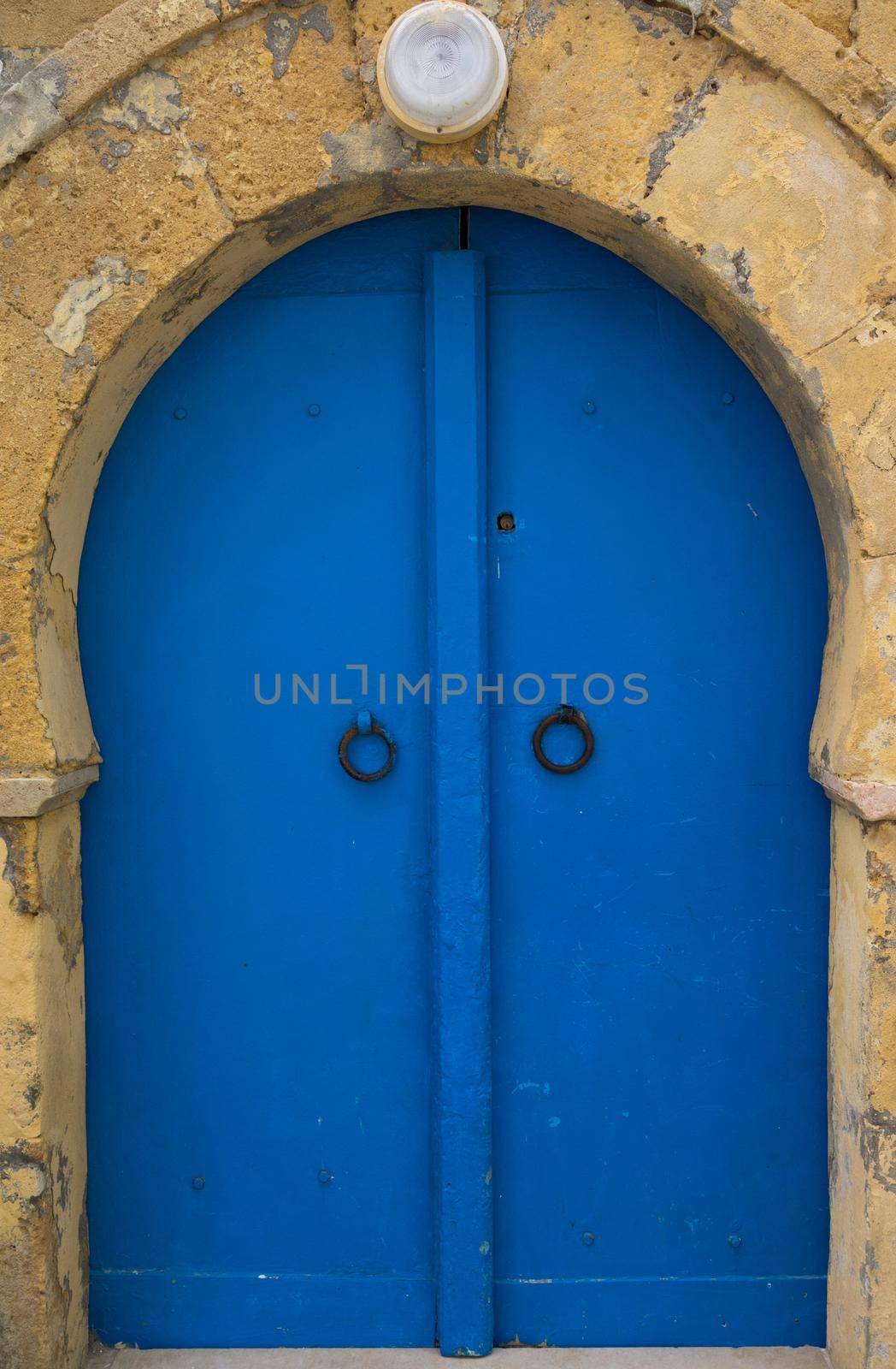 Traditional blue arched door from Sidi Bou Said  by Arsgera