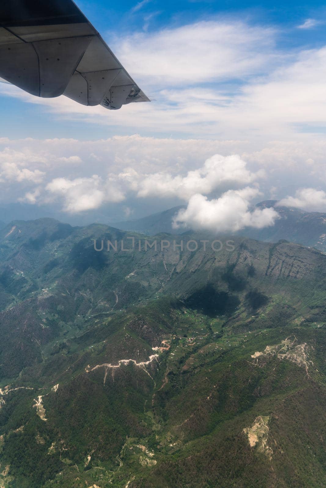 Nepal and Himalayas landscape view from airplane. Tourism and traveling to Nepal