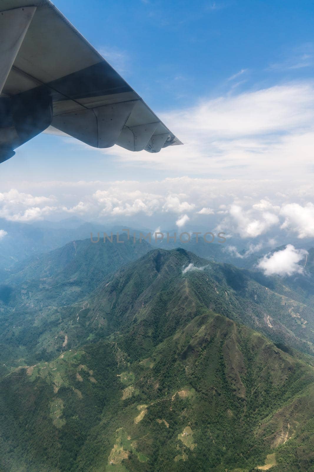 Nepal and Himalayas landscape view from airplane. Tourism and traveling to Nepal