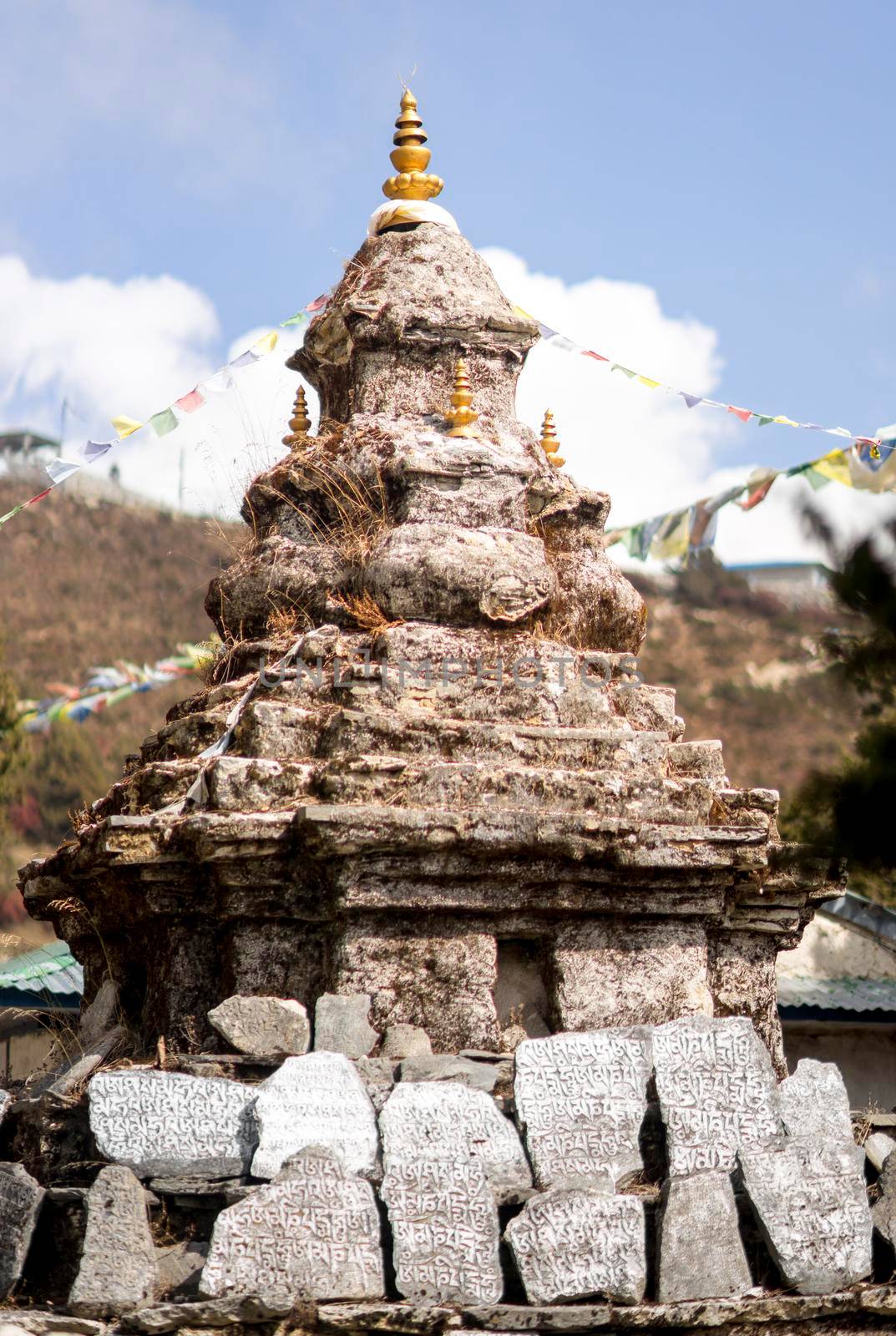 Buddhism stupa or chorten with prayer flags in Himalayas. travel to Nepal. relegion and culture