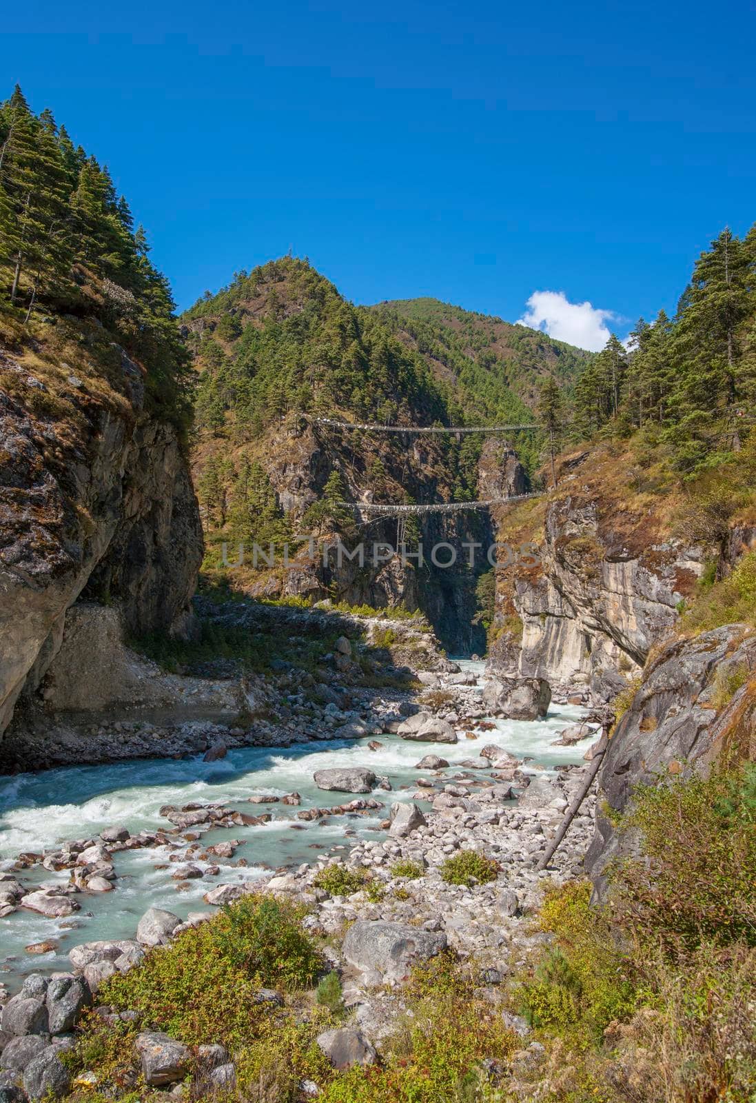 Suspension bridge on the way to Namche Bazar in Himalayas. Everest base camp trek in Nepal. Hillary bridge