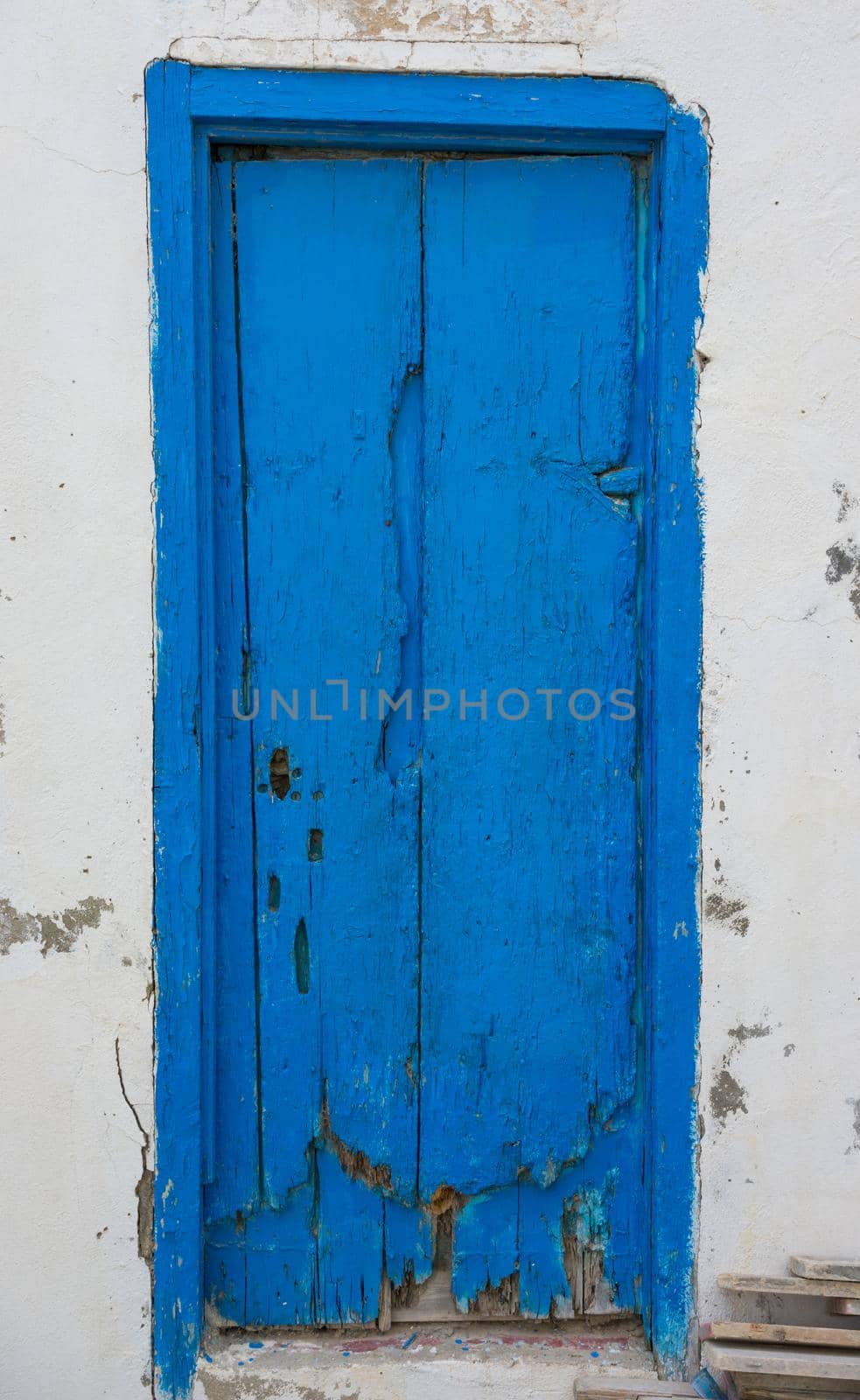 Blue aged door from Sidi Bou Said in Tunisia. Culture of Tunisia