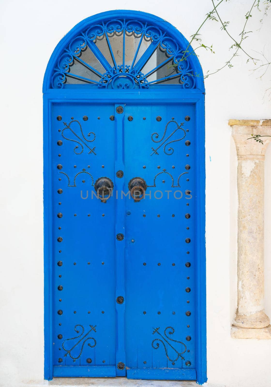 Blue Traditional door with arch from Tunisia. Sidi Bou Said