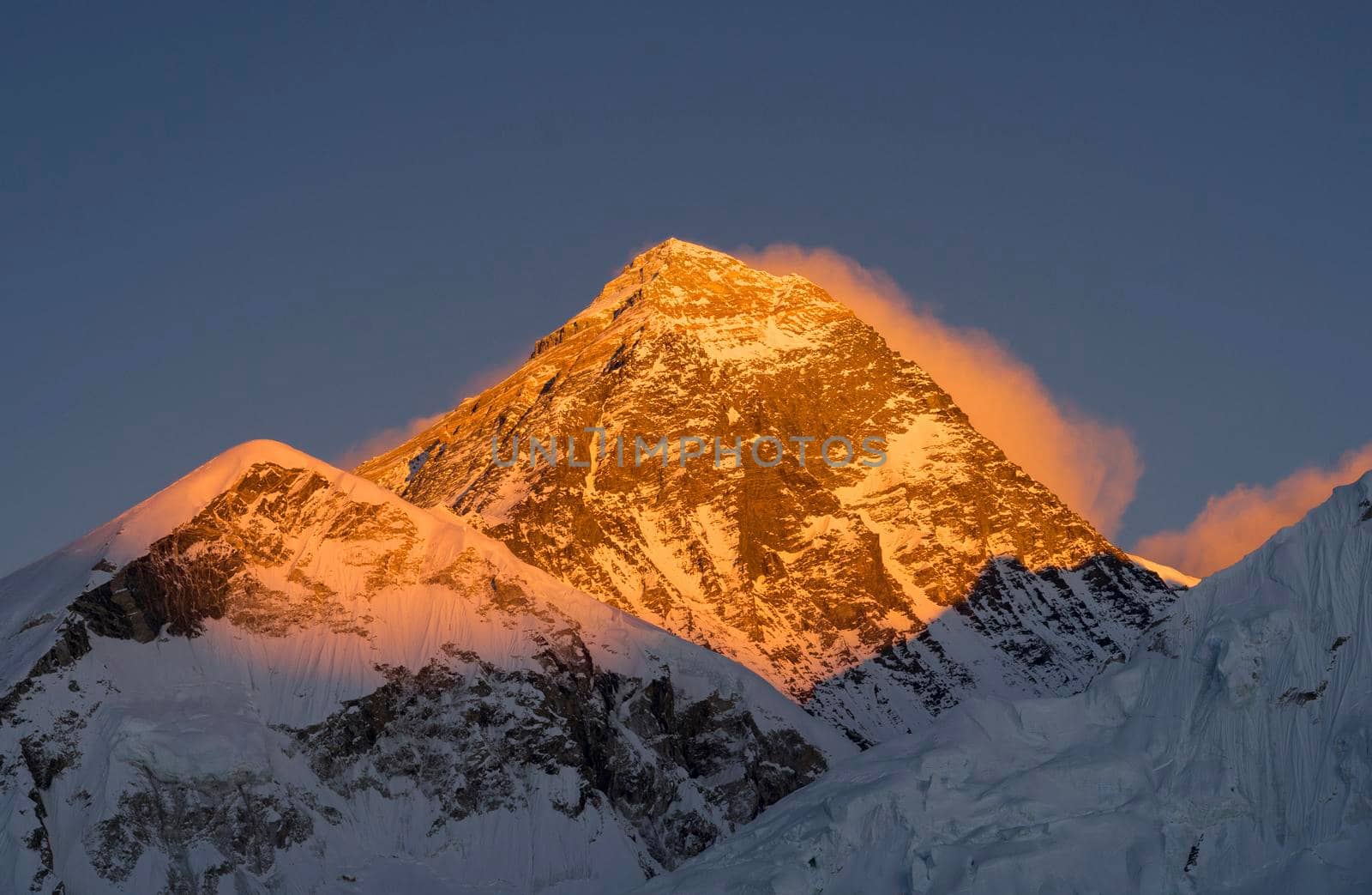 Everest summit or peak at sunset or sunrise by Arsgera